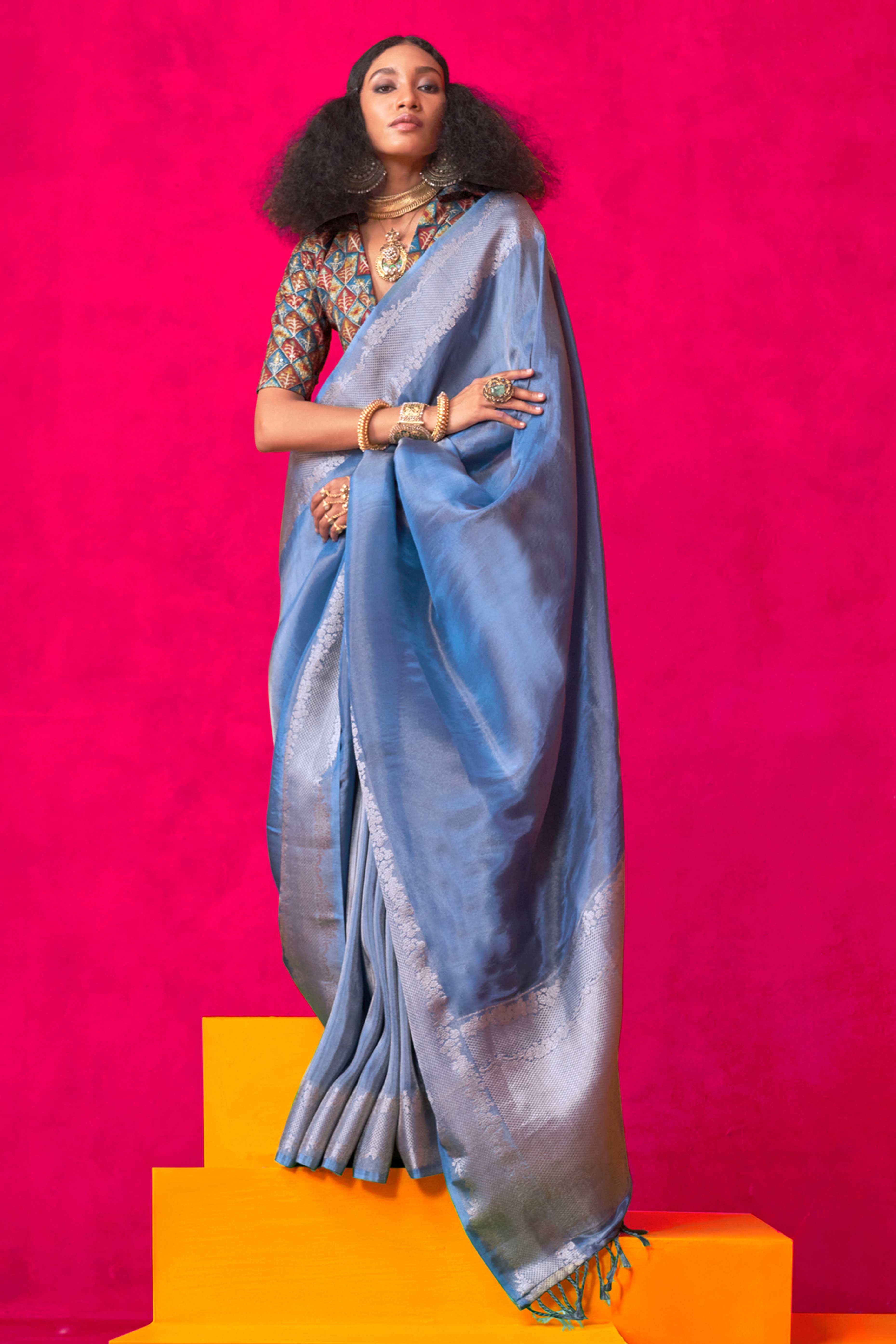 Blue Tissue Saree Adorned with Zari Weaving Border