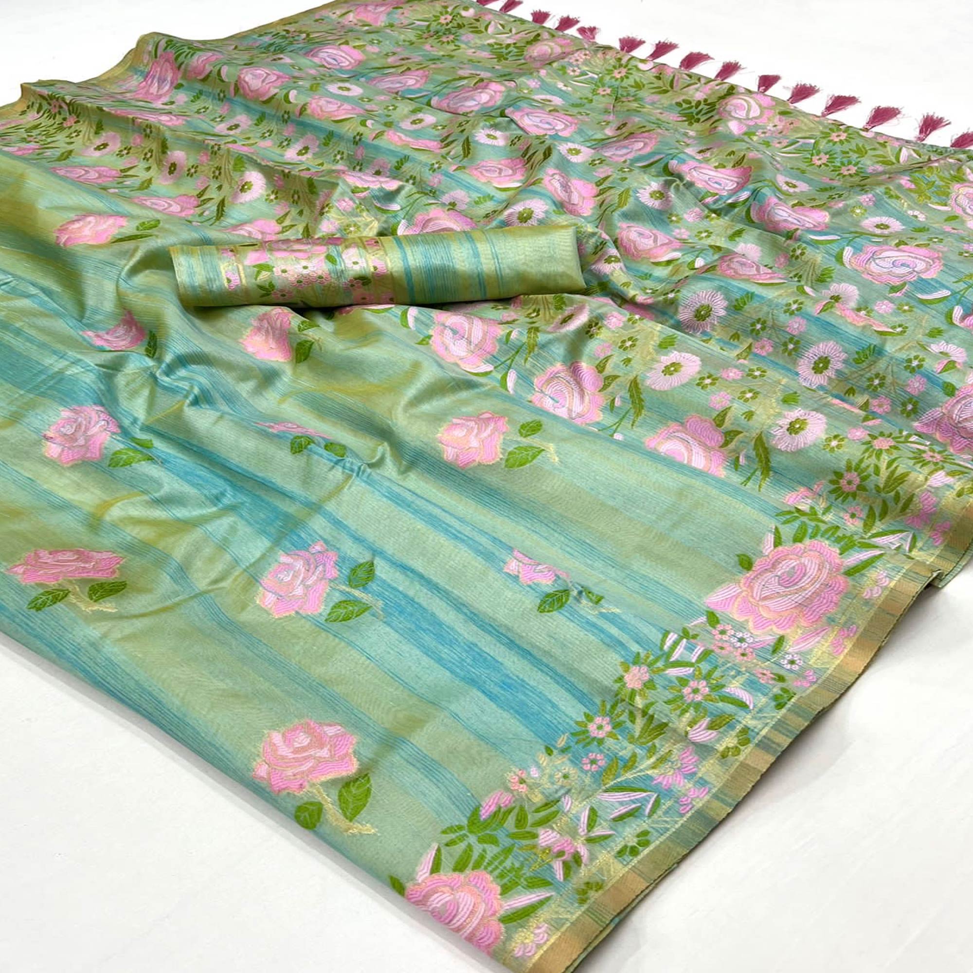 Pista Green Floral Woven Pure Silk Saree With Tassels