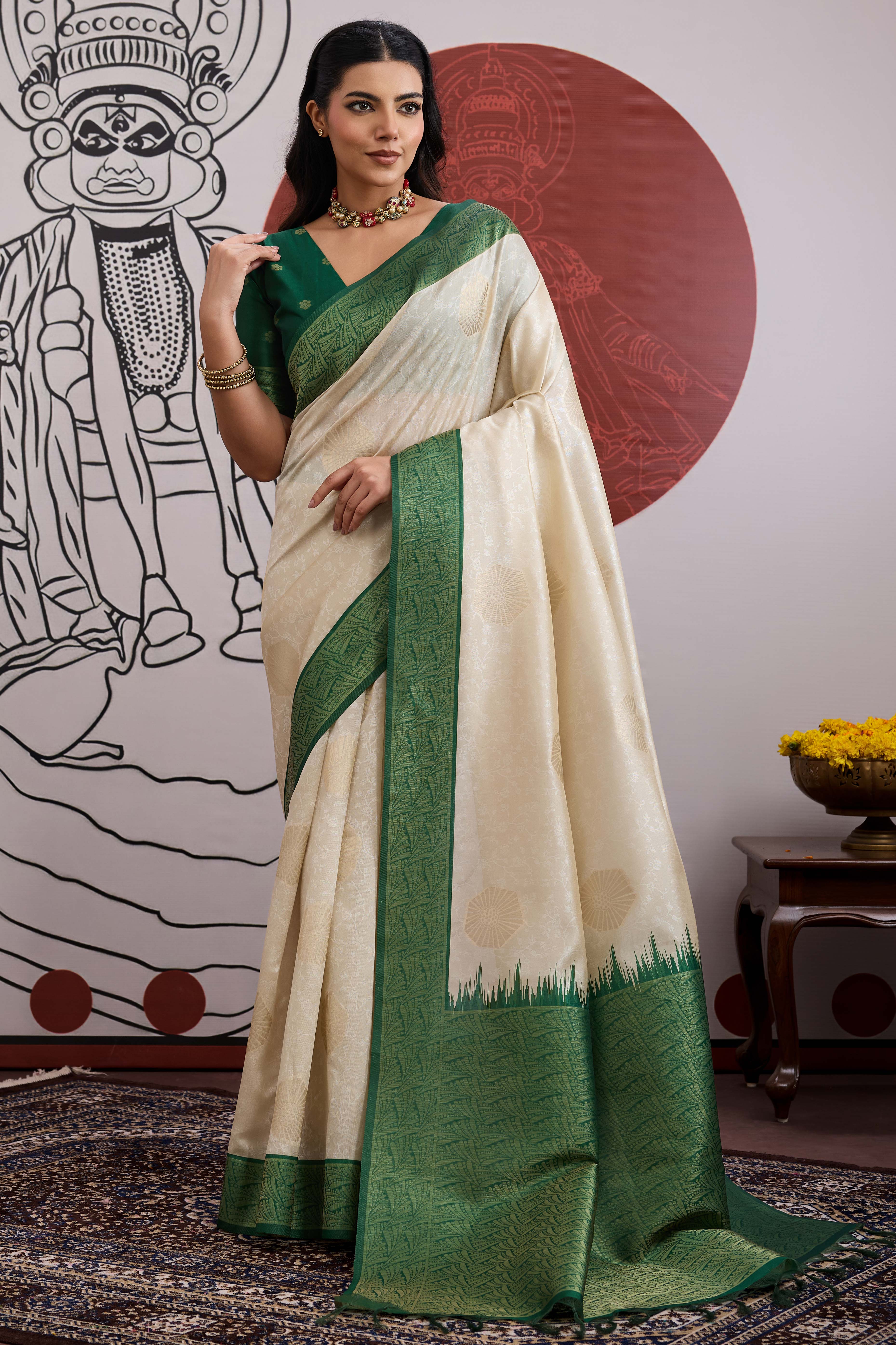 Graceful Cream & Green Zari Weaving Silk Saree Highlighted By Decorative Tassel Pallu