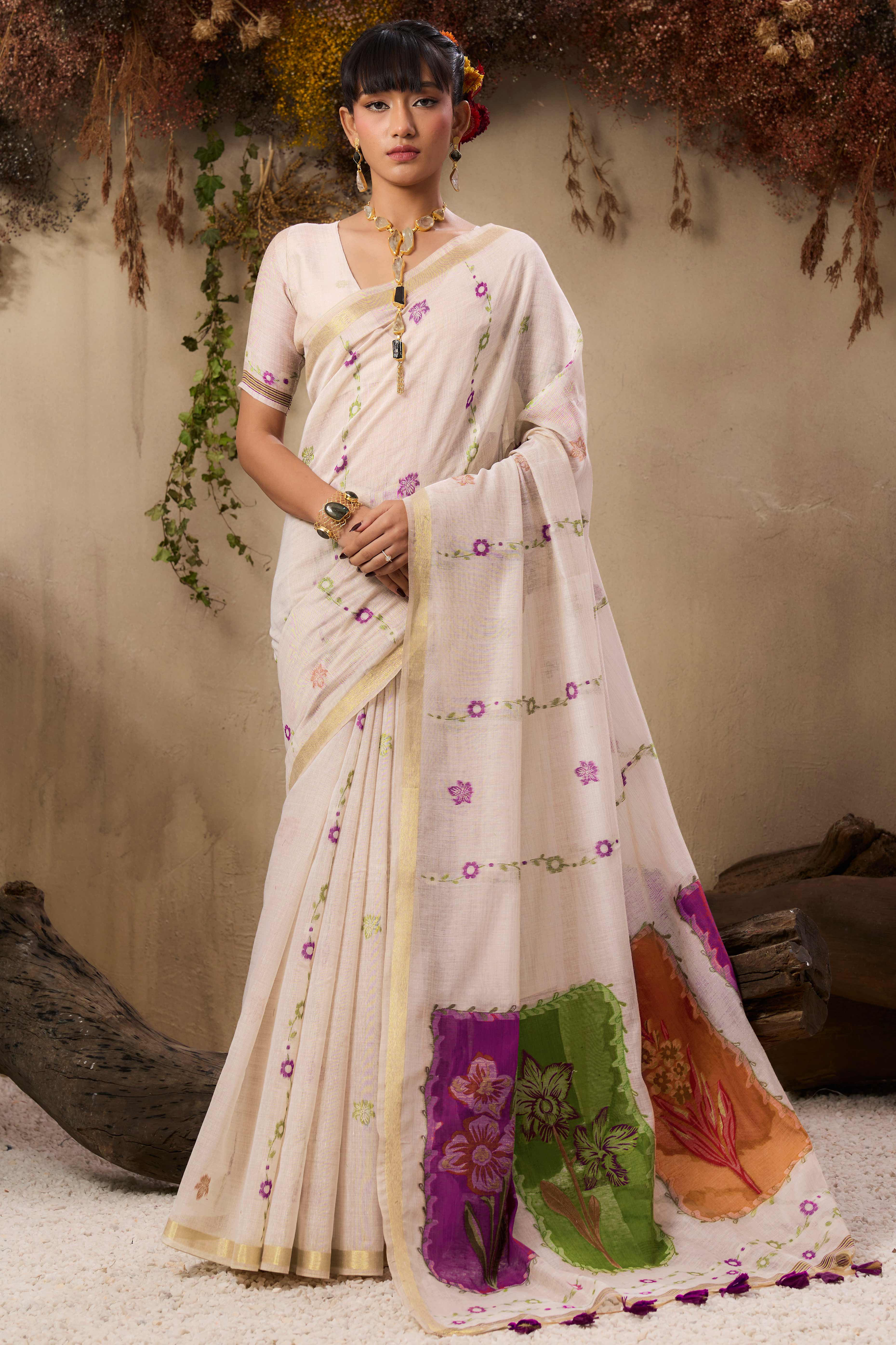 Cream Pure Munga Cotton Blend Saree Adorned with Intricate Floral Weaves