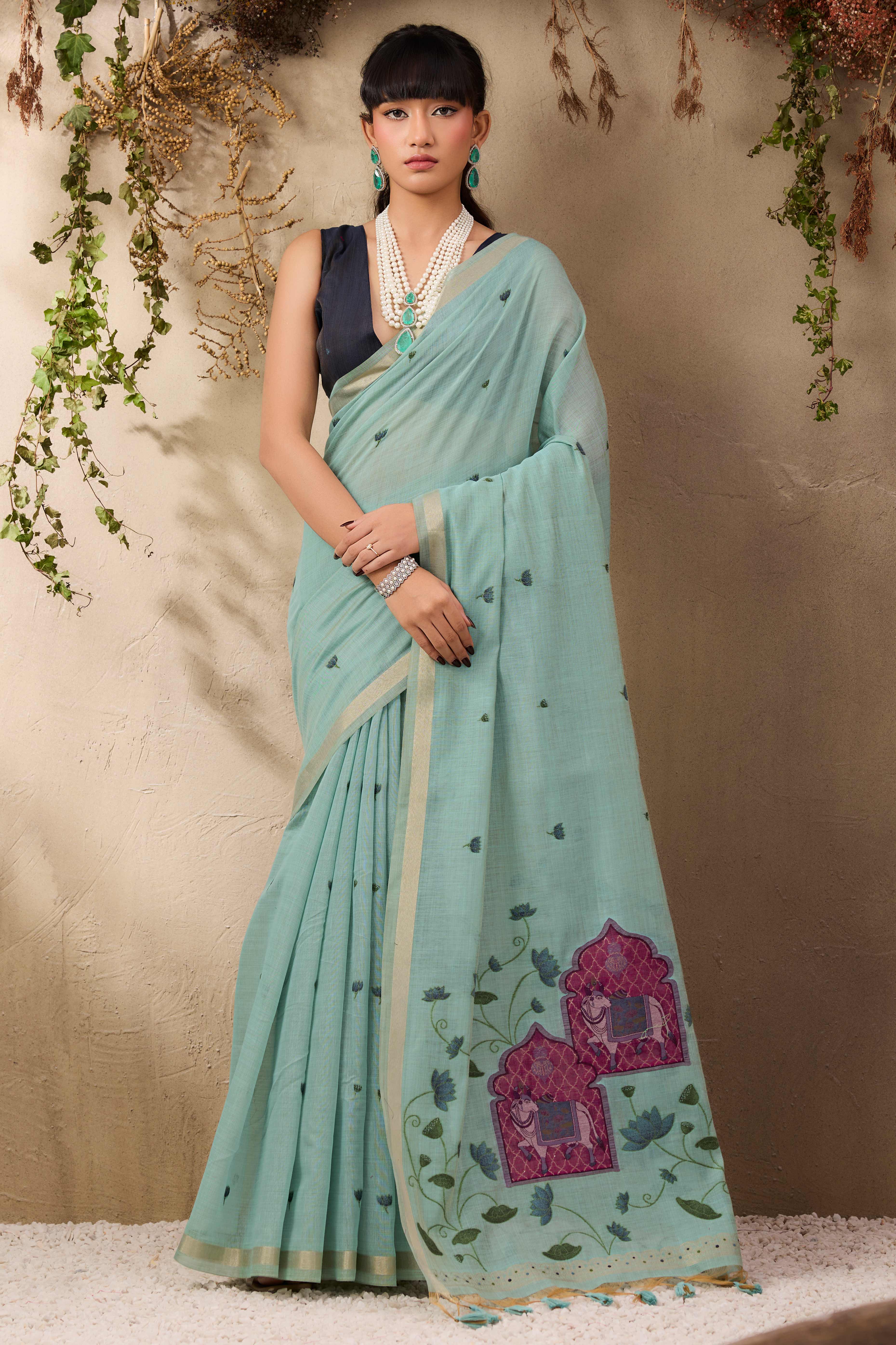Sea Green Lightweight Handloom Munga Cotton Blend Saree Accented with Floral Woven Motifs