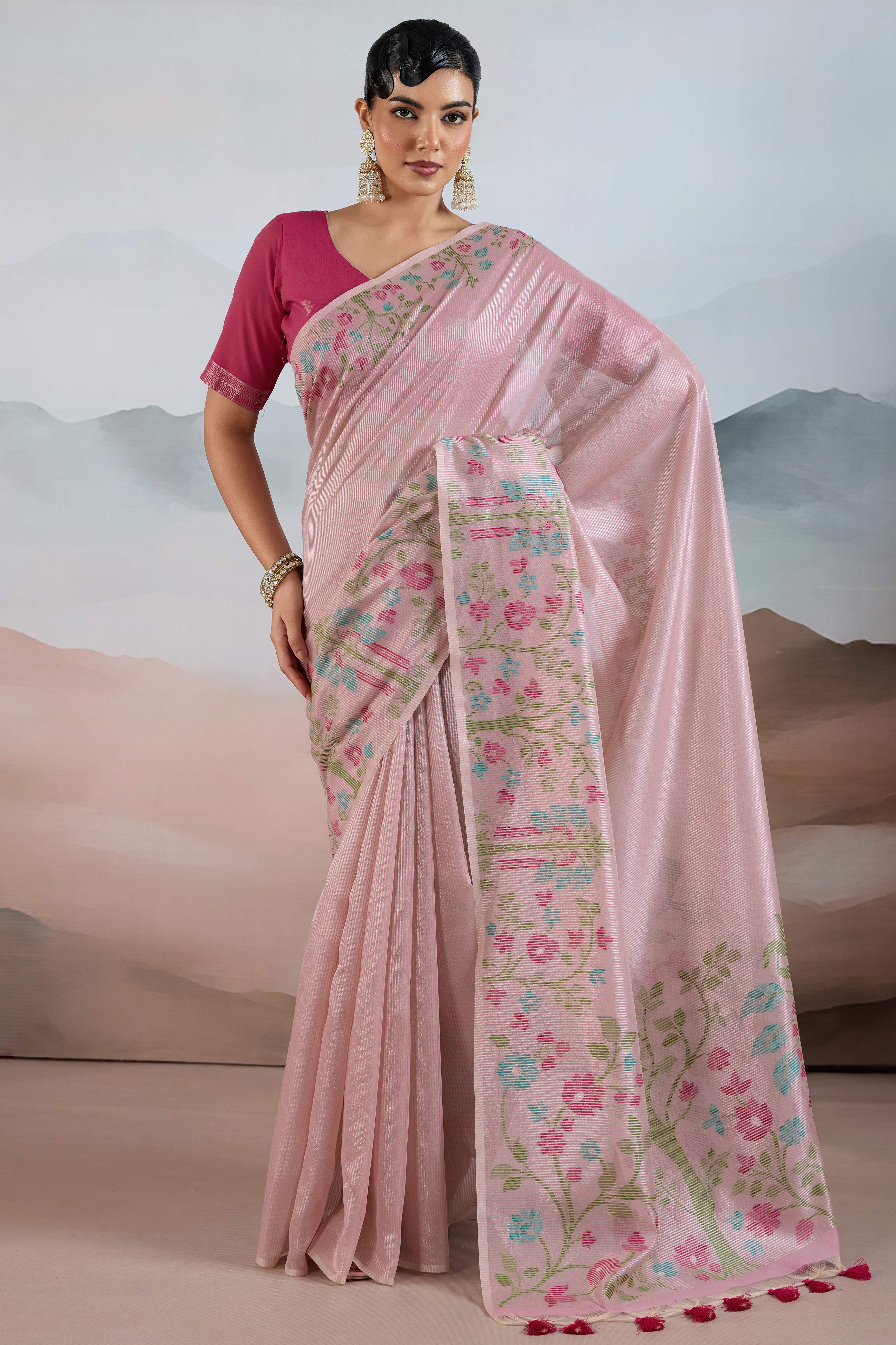 Pink Tissue Silk Saree Showcasing Floral & Striped Weaving With Tassel Adornment