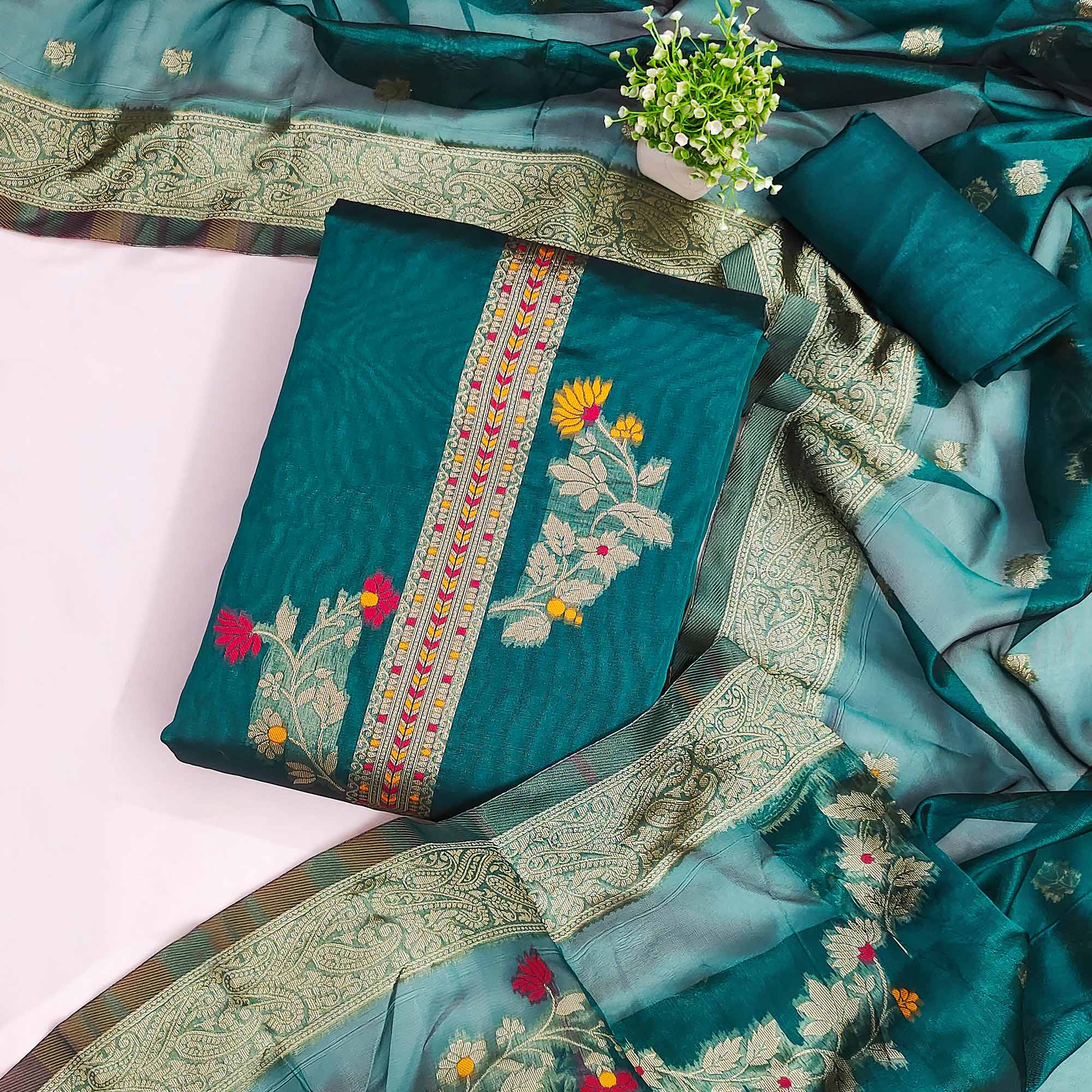 Teal Chanderi Silk Dress Material Adorned With Elegant Floral Zari Weaving