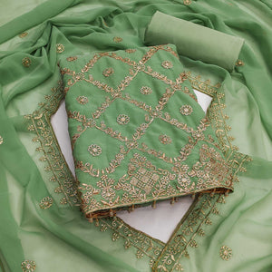 Green Georgette Dress Material Adorned With Floral Zari Embroidery Work