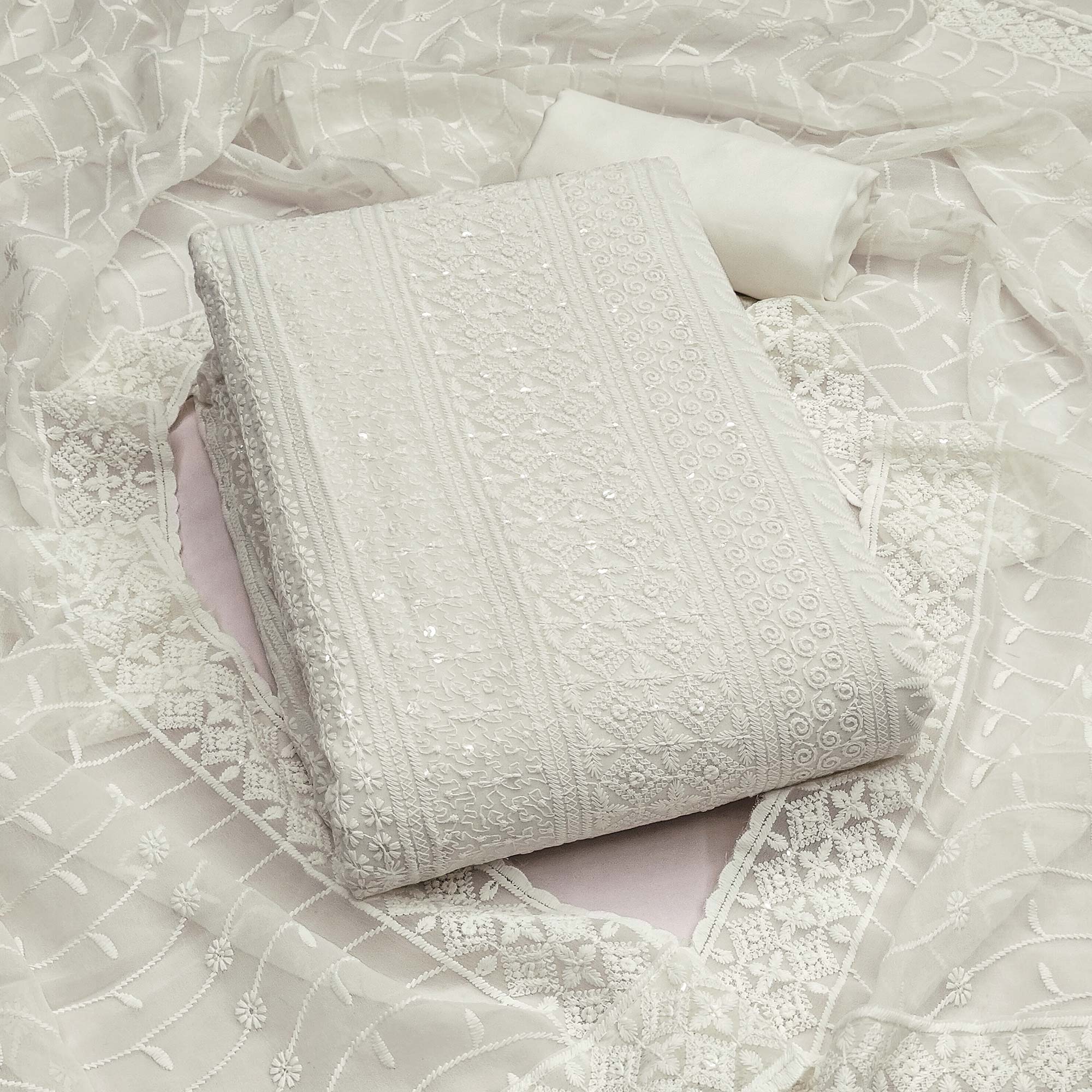 White Floral Thread Embroidery With Sequins Highlighted Georgette Dress Material