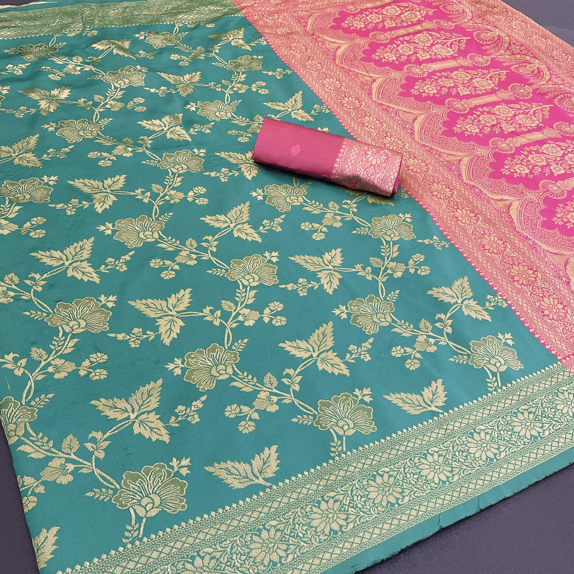 Graceful Rama Blue & Pink Banarasi Silk Saree Featuring Intricate Floral Zari Weaving Work