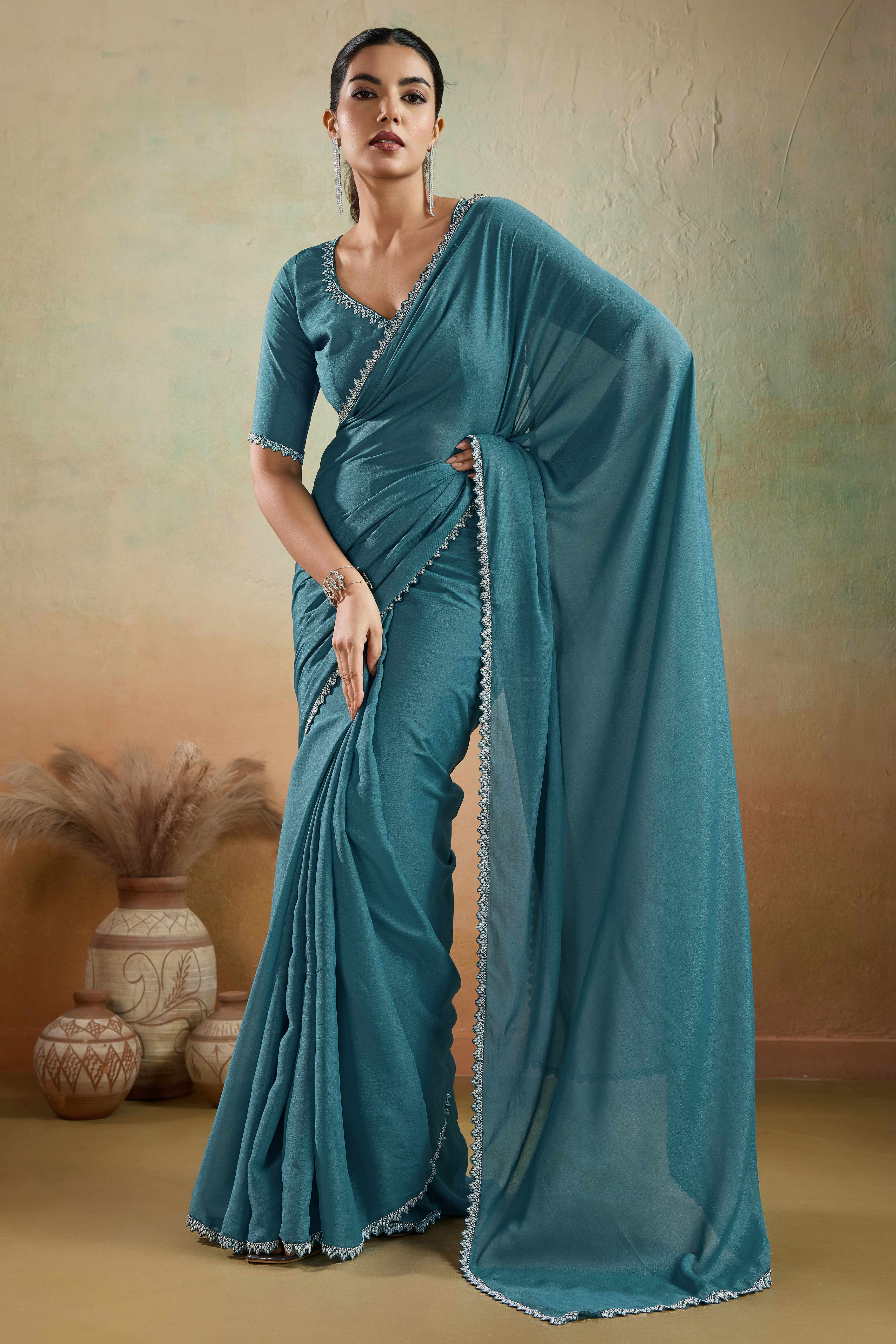 Teal Blue Solid Matt Georgette Saree With Ceramic Embellished Lace Border