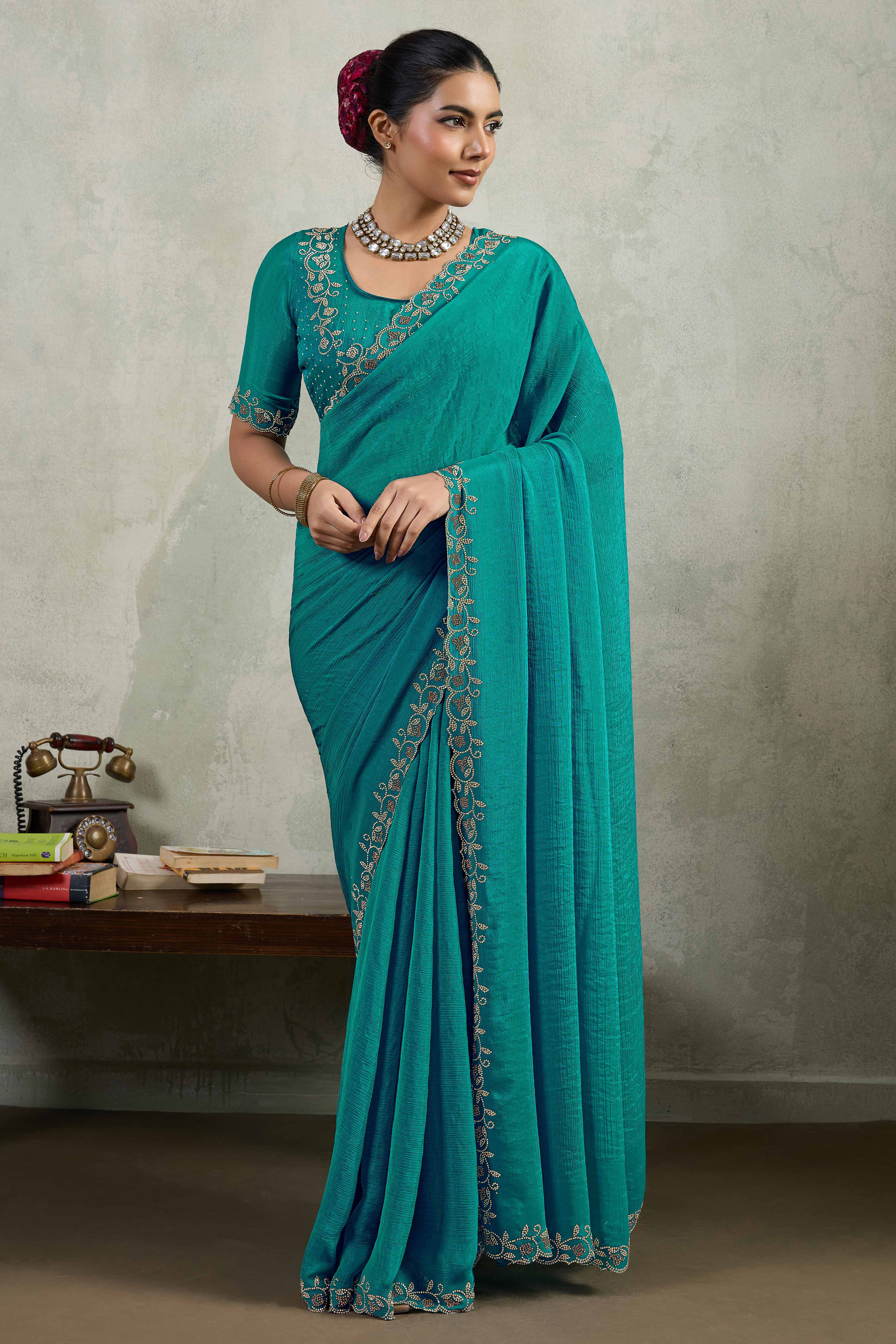 Teal Velvet Chiffon Saree Accented with Sparkling Zarkan Detailing