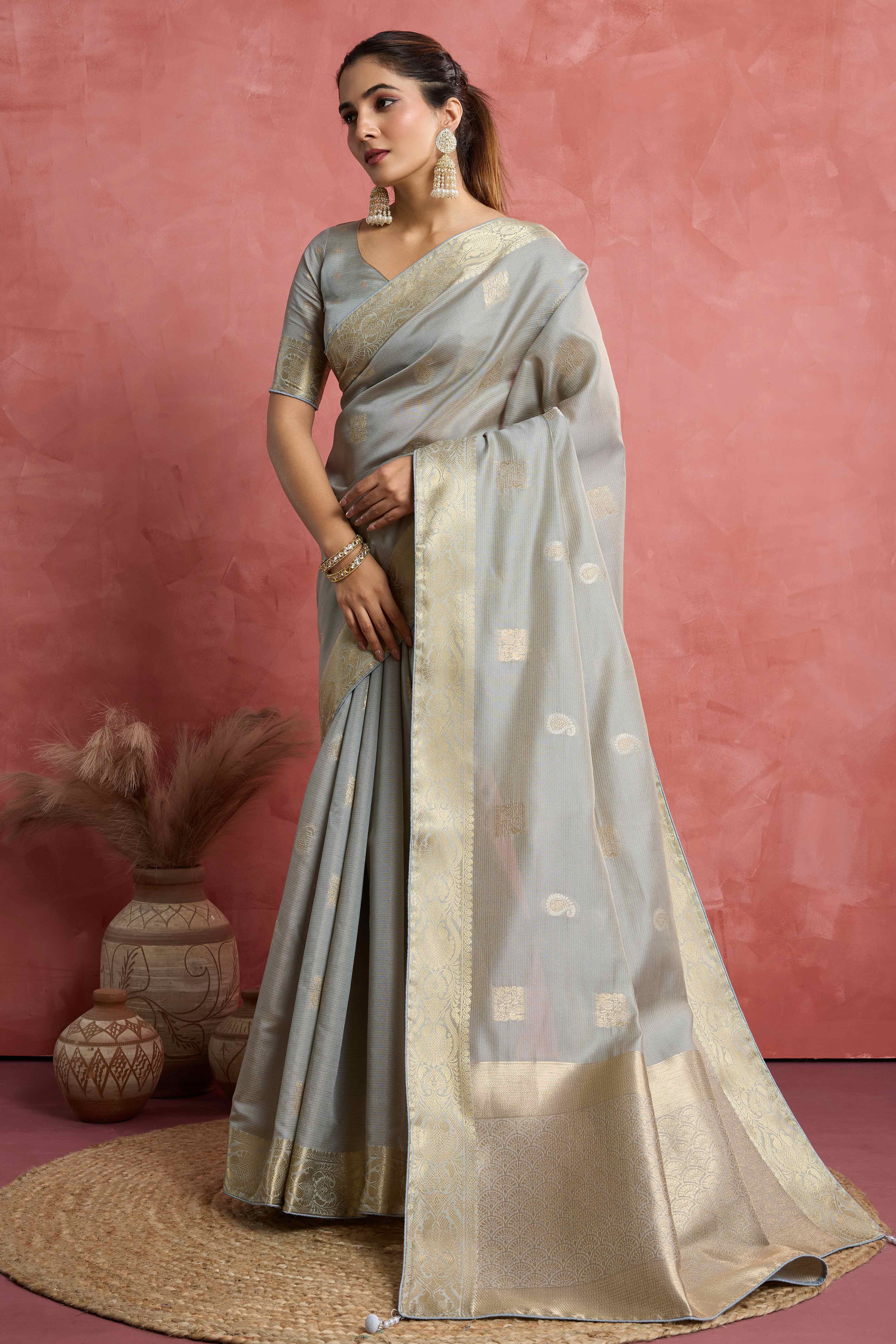 Contemporary Grey Silk Blend Saree Flaunting Alternate Buttas With Piping & Tassel Accents