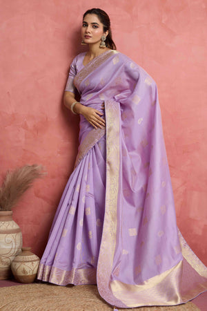 Contemporary Lavender Silk Blend Saree Flaunting Alternate Buttas With Piping & Tassel Accents