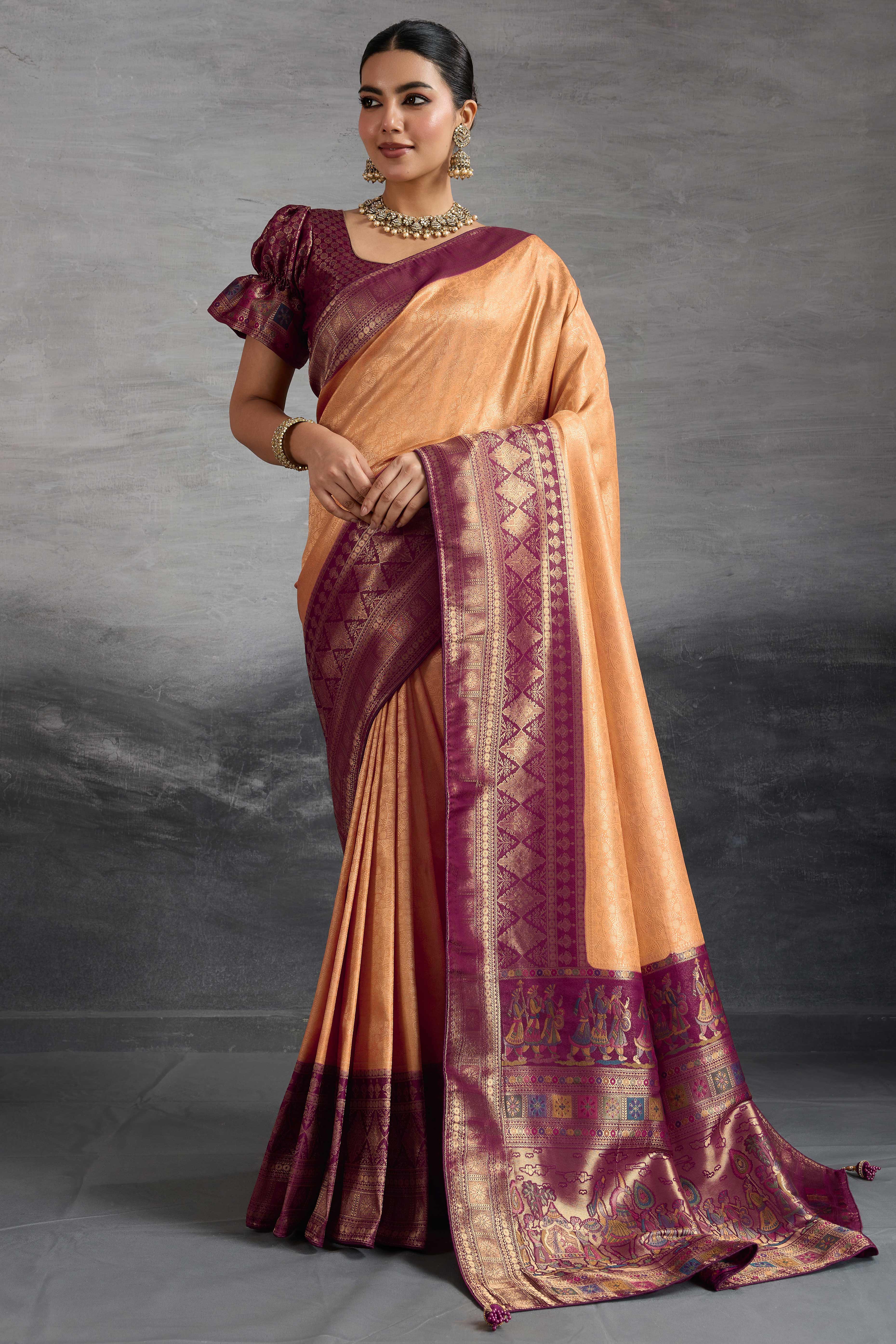 Peach Silk Kanjivaram Silk Saree Enhanced With Meenakari Weaving Borders