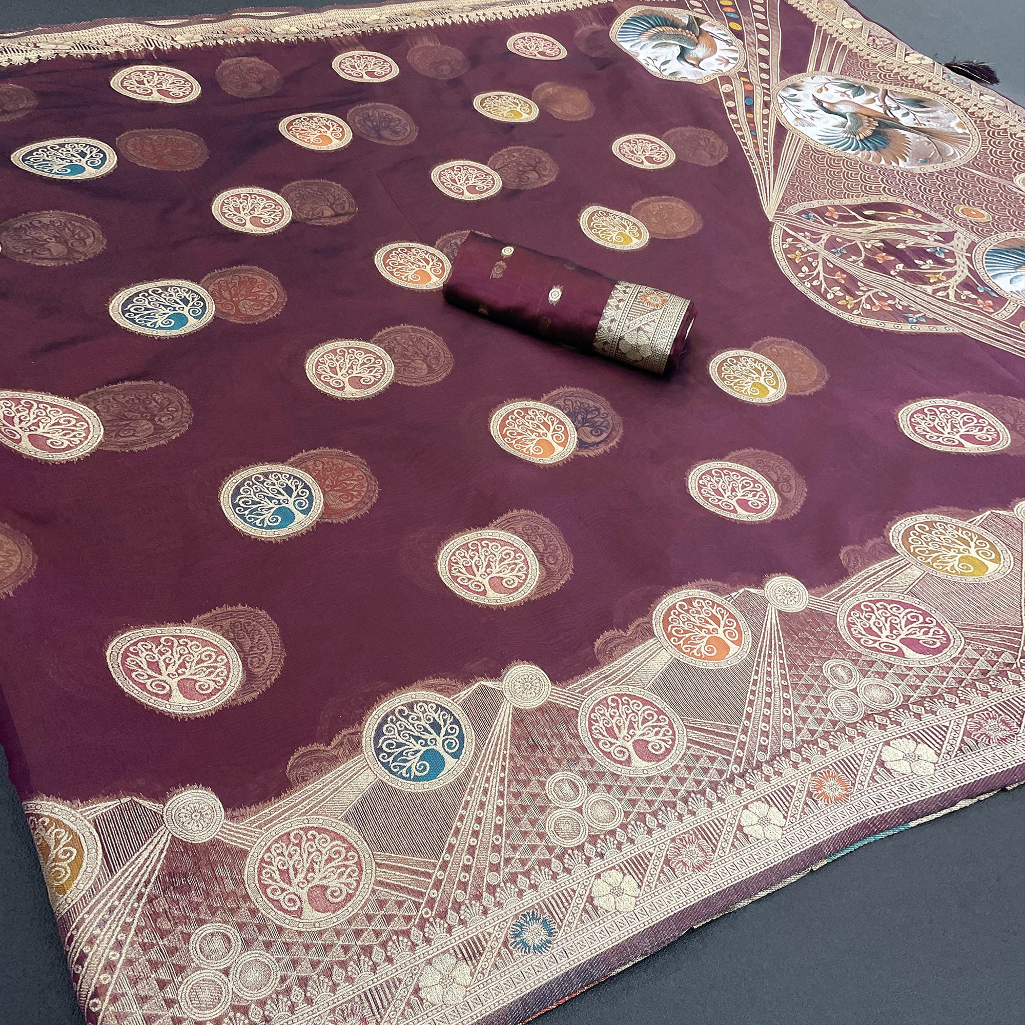 Charming Wine Zari Woven Floral Organza Saree Accented With Digital Printed Pallu & Latkan