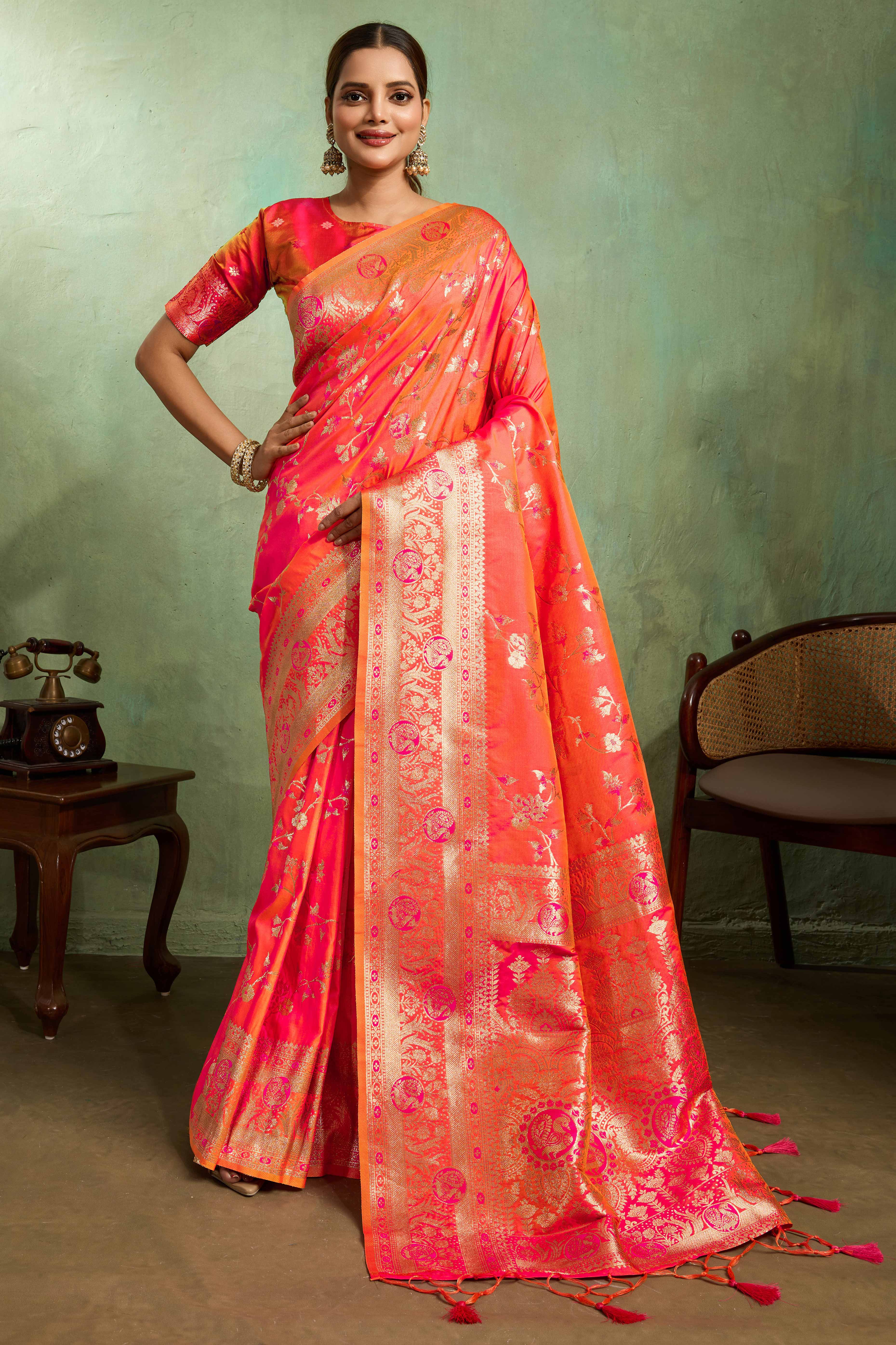 Coral Red Dual Tone Banarasi Silk Saree Accented with Meenakari Weaves
