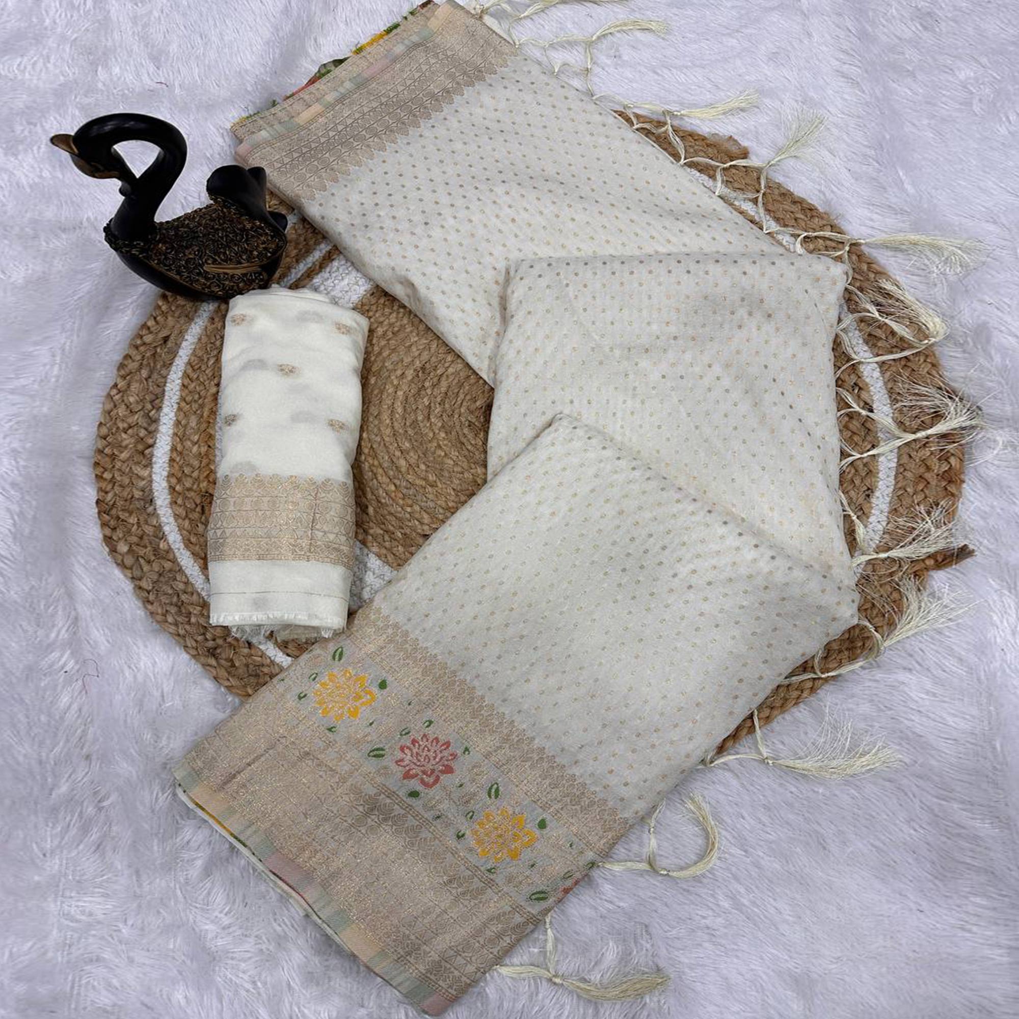 Off White Saree in Pure Georgette Featuring Delicate Zari Butti Work