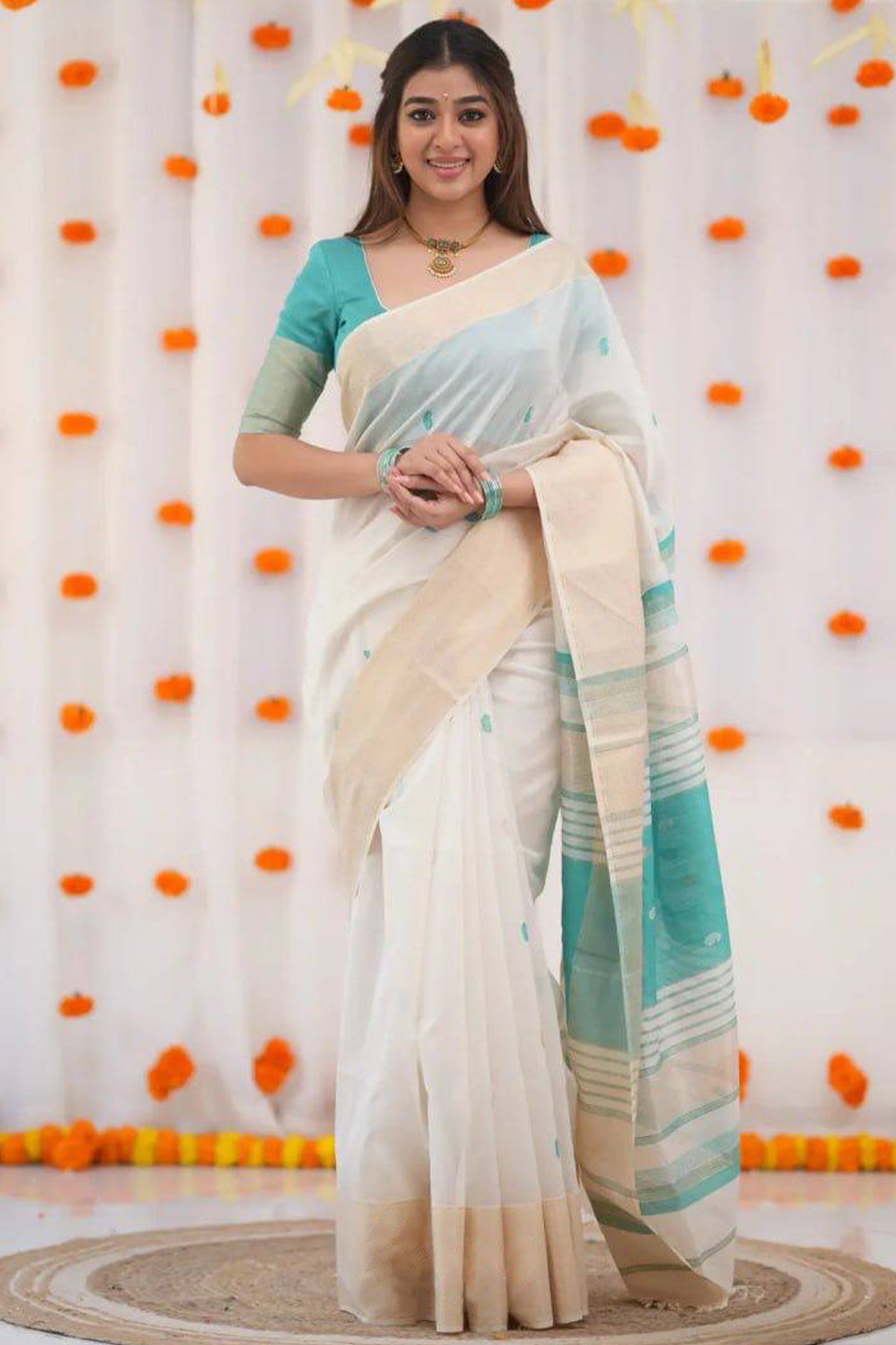 White and Turquoise Zari-Woven Linen Cotton Saree Offering a Refined Festive Look