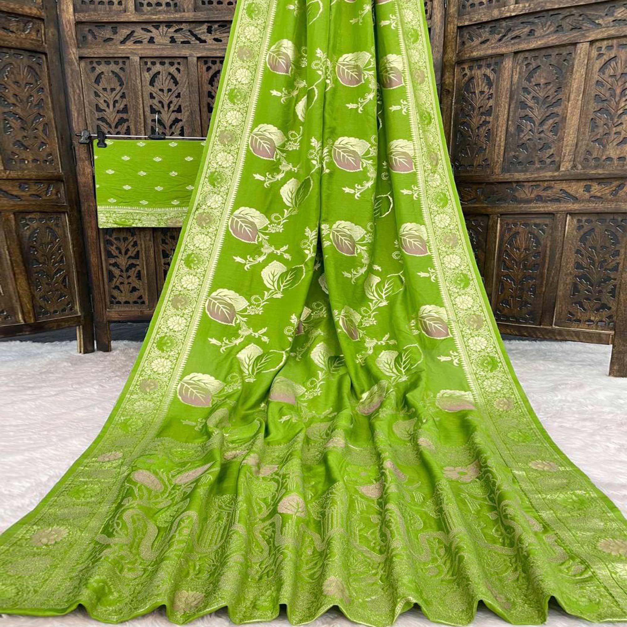 Green Soft Dola Silk Saree Adorned with Intricate Meenakari-Style Weaving