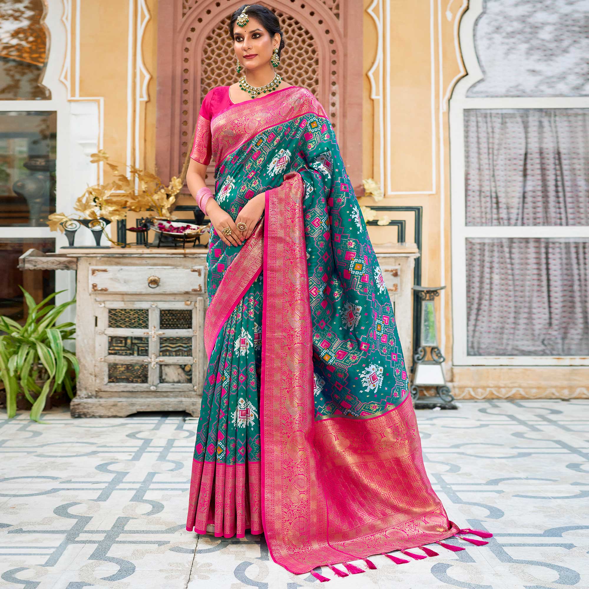 Teal Woven Art Silk Patola Saree With Tassels