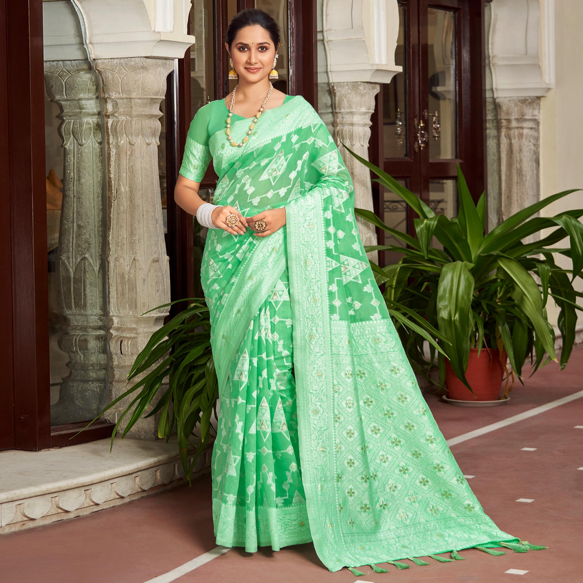 Green Woven Cotton Silk Saree With Tassels