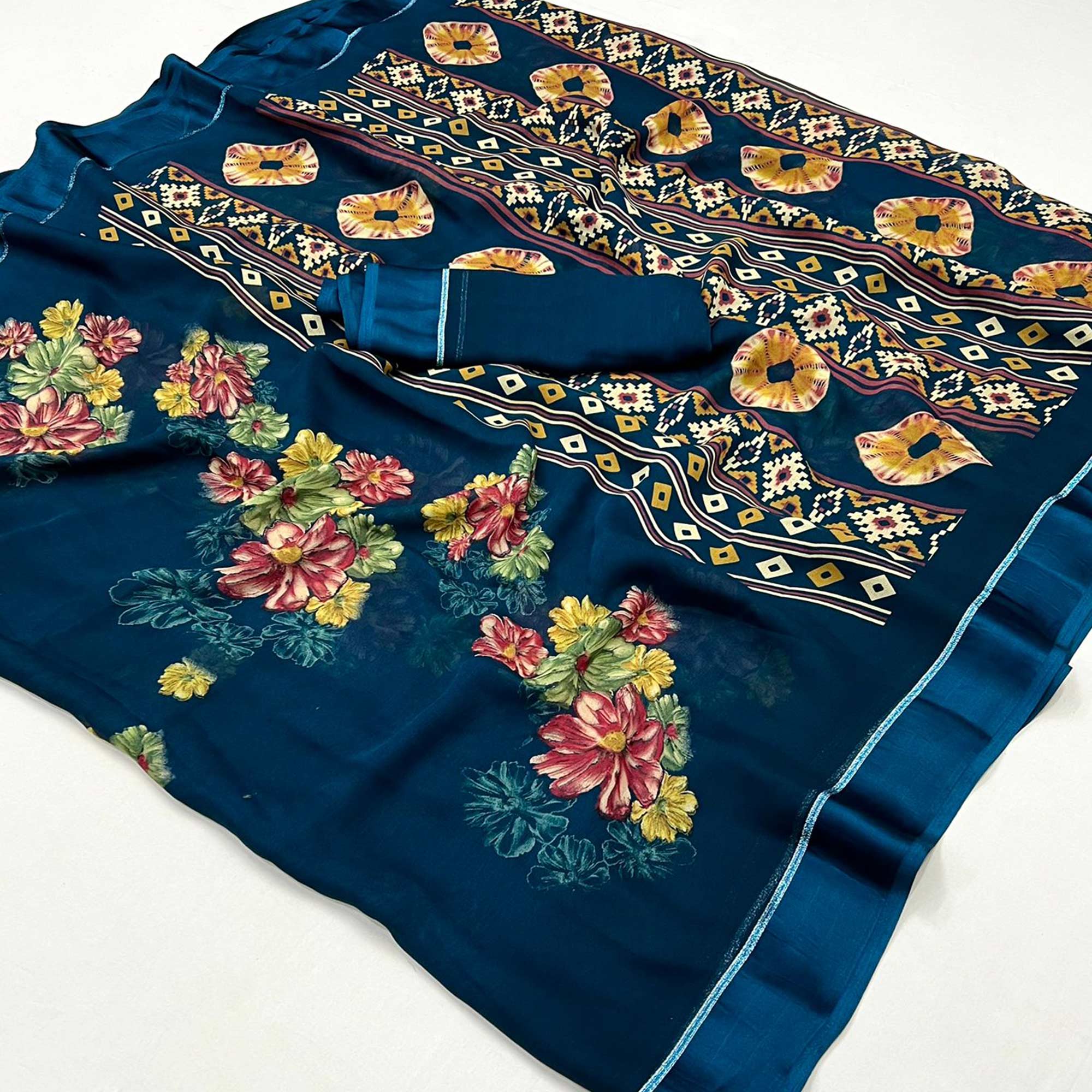 Blue Floral Printed Georgette Saree With Fancy Zari Border