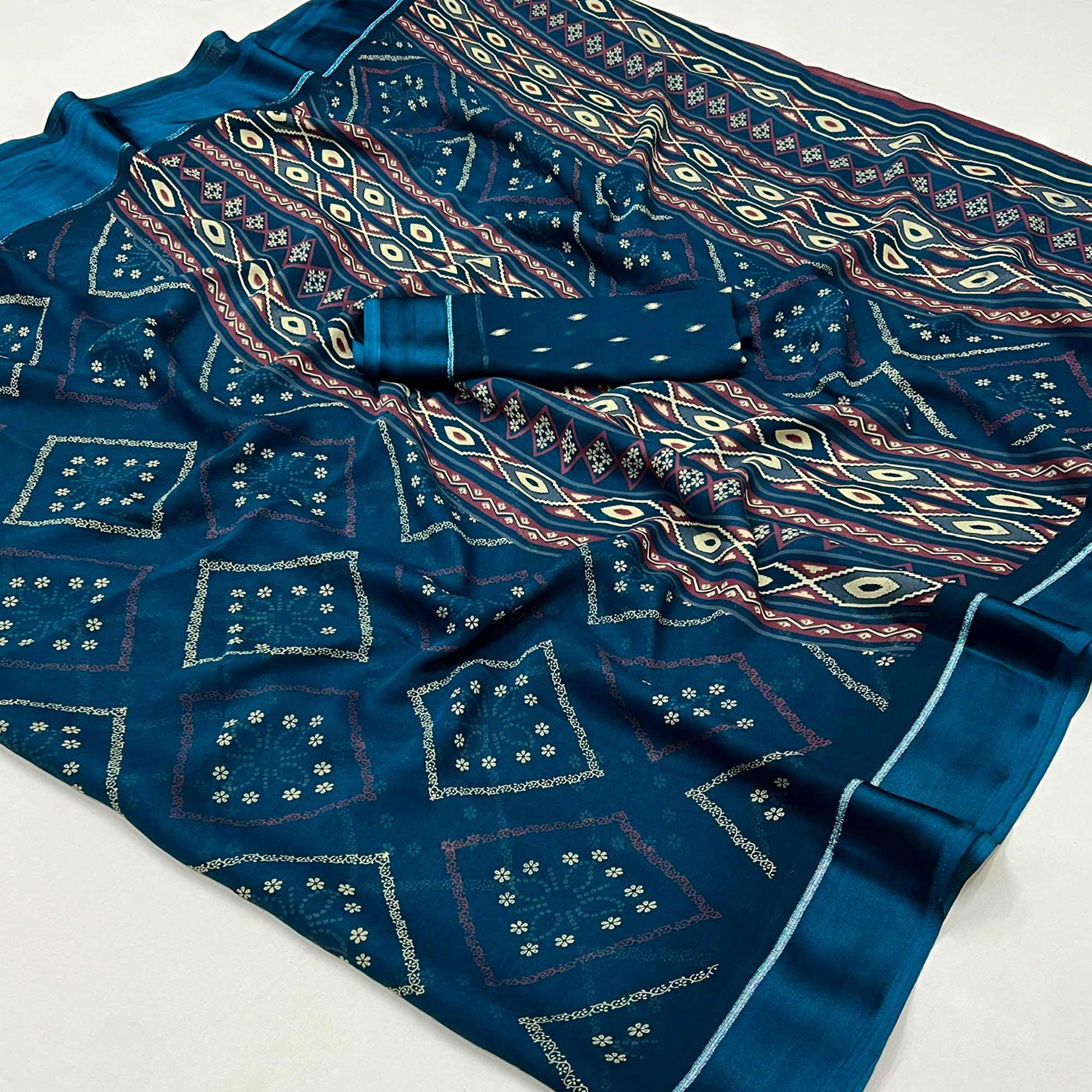 Blue Floral Printed Georgette Saree With Fancy Zari Border