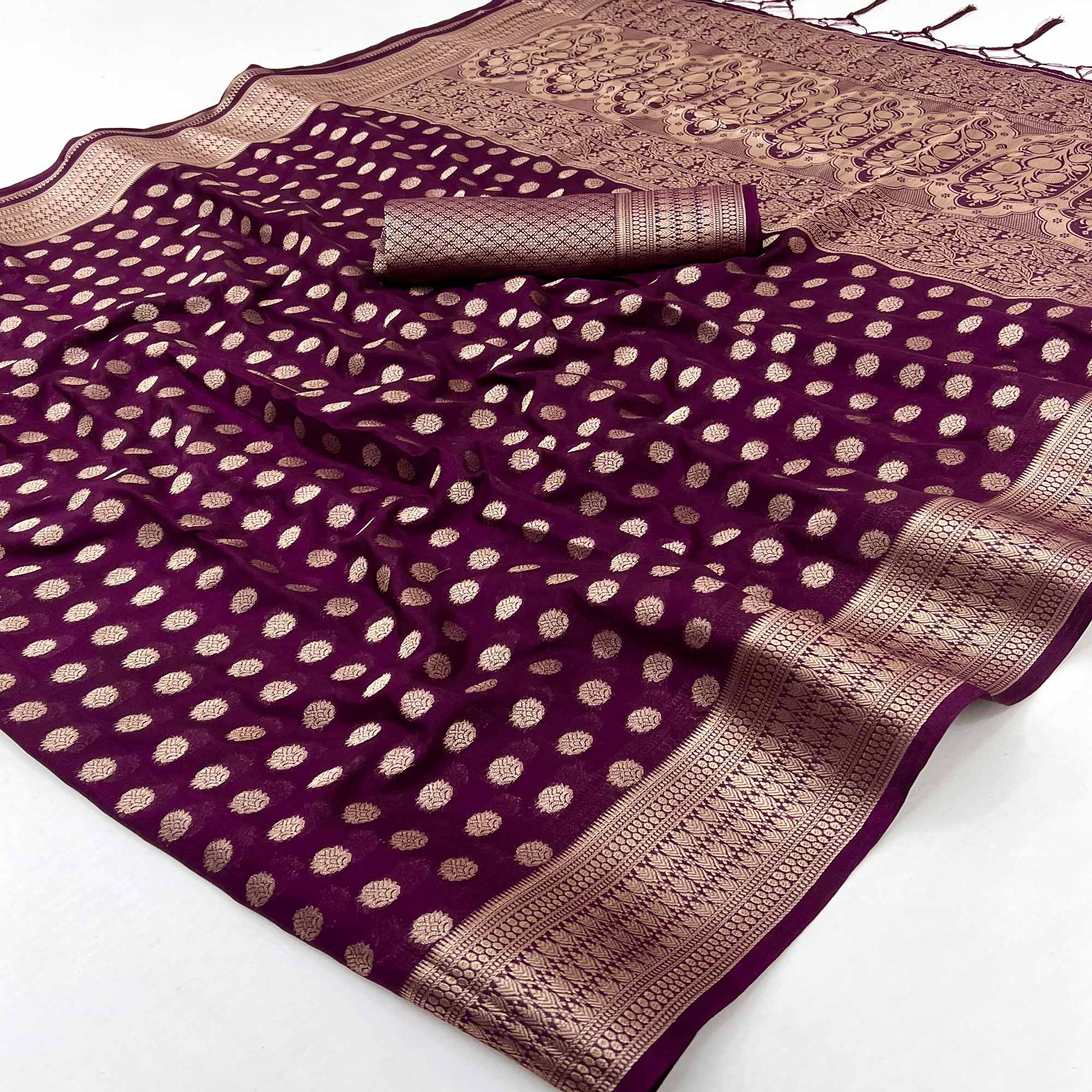 Wine Floral Zari Woven Crepe Silk Saree Accented With Tassel Pallu