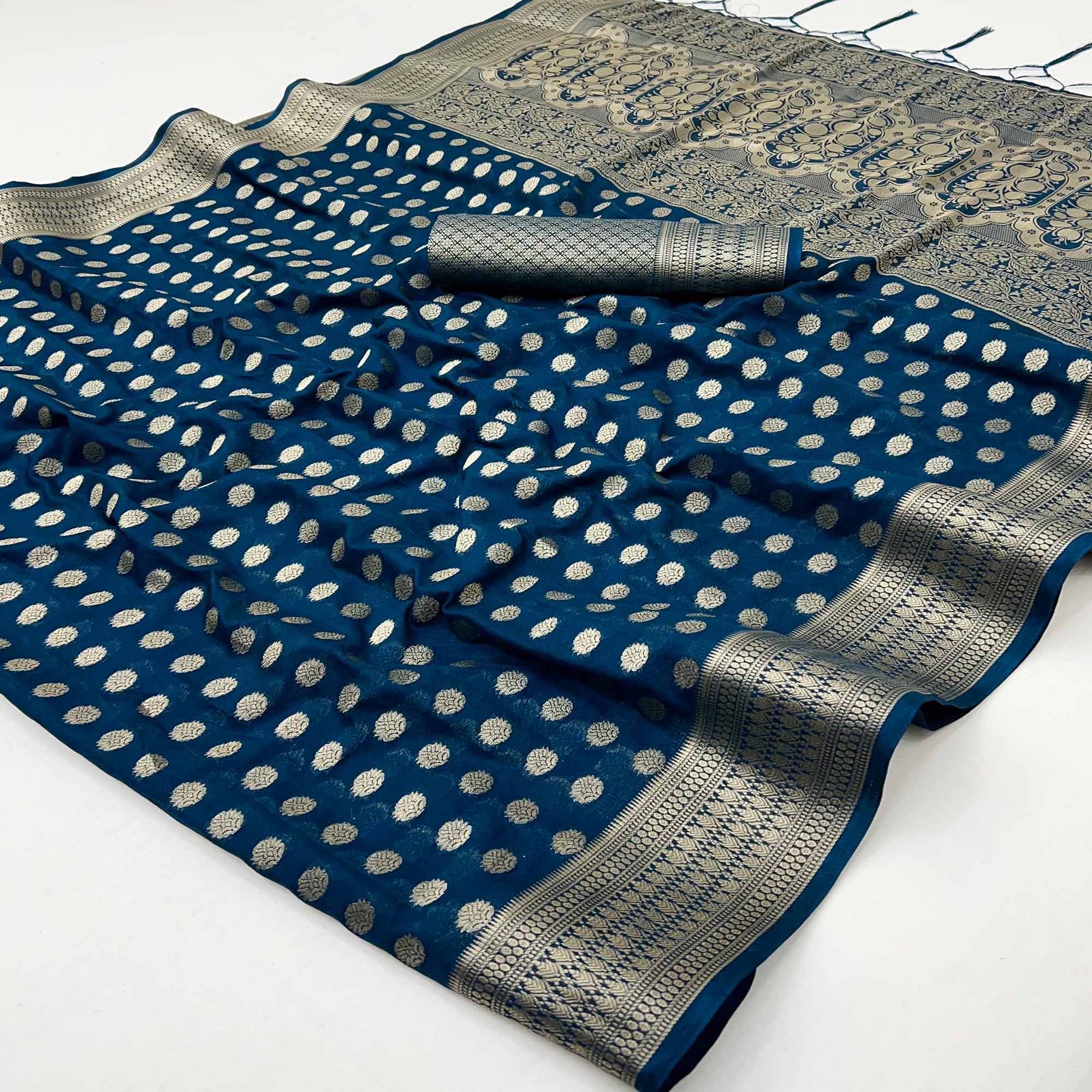 Dark Teal Blue Floral Zari Woven Crepe Silk Saree Accented With Tassel Pallu