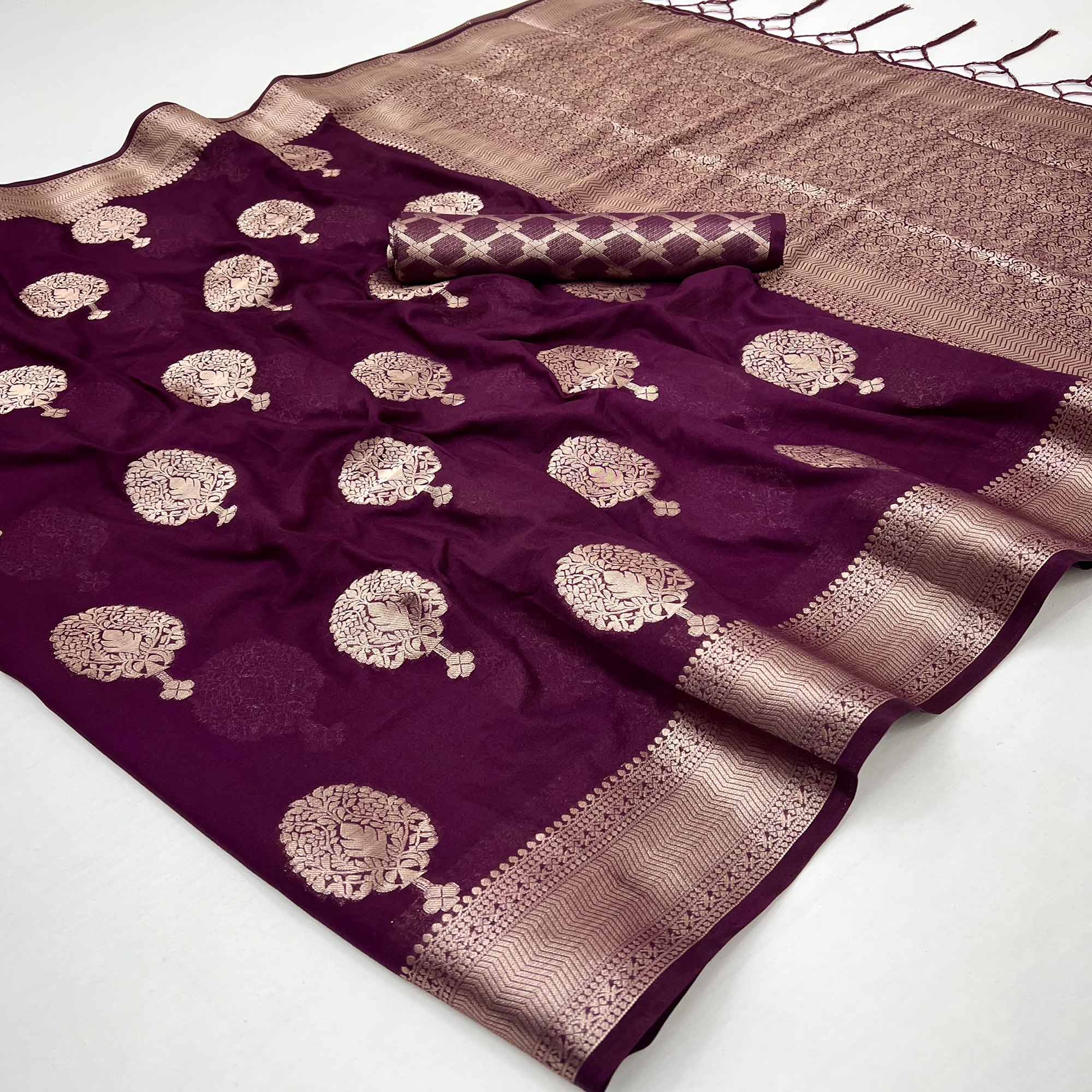 Wine Crepe Silk Saree Featuring Floral Zari Weave & Graceful Tassel Pallu