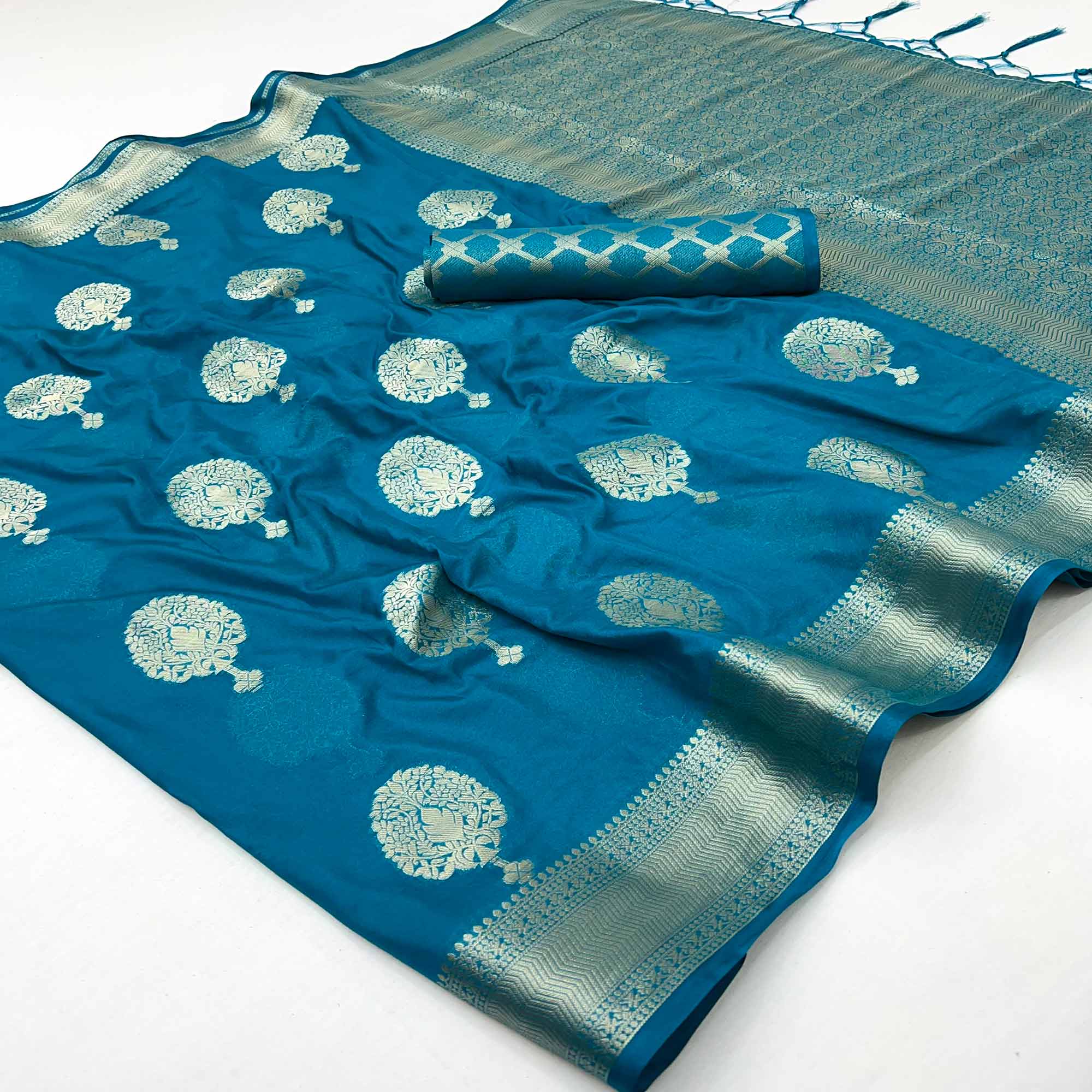 Teal Blue Crepe Silk Saree Featuring Floral Zari Weave & Graceful Tassel Pallu