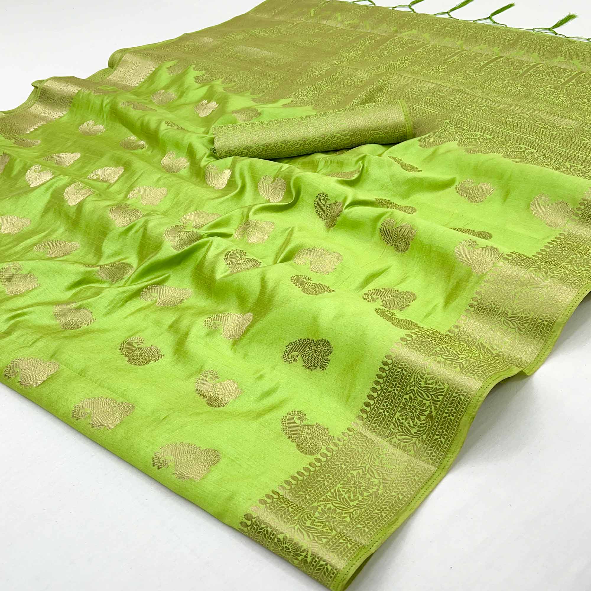 Green Tusser Cotton Silk Saree Adorned With Floral Zari Weave & Tassel Pallu
