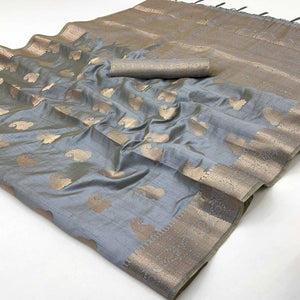 Grey Tusser Cotton Silk Saree Adorned With Floral Zari Weave & Tassel Pallu