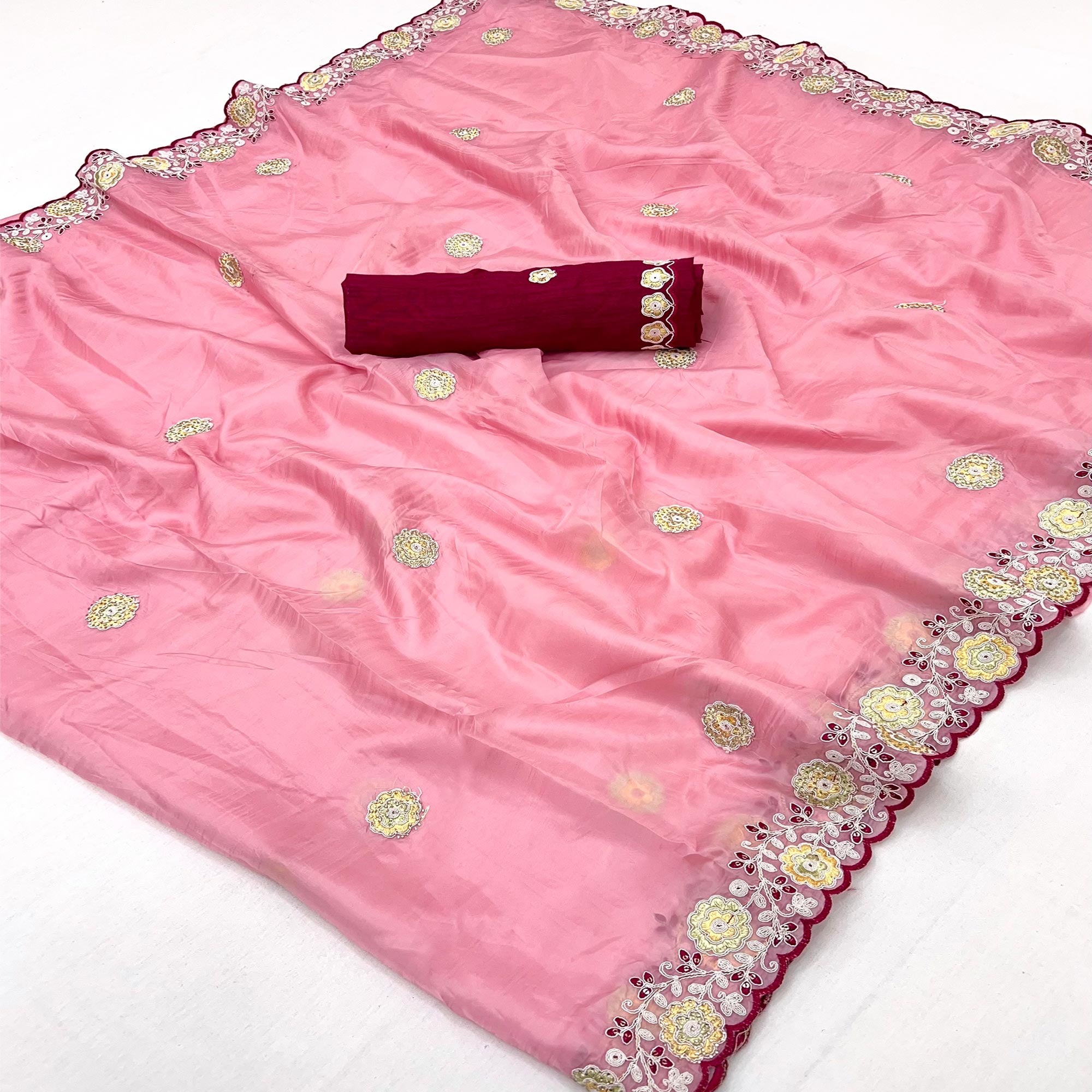 Pink Organza Saree Adorned with Intricate Floral Embroidery