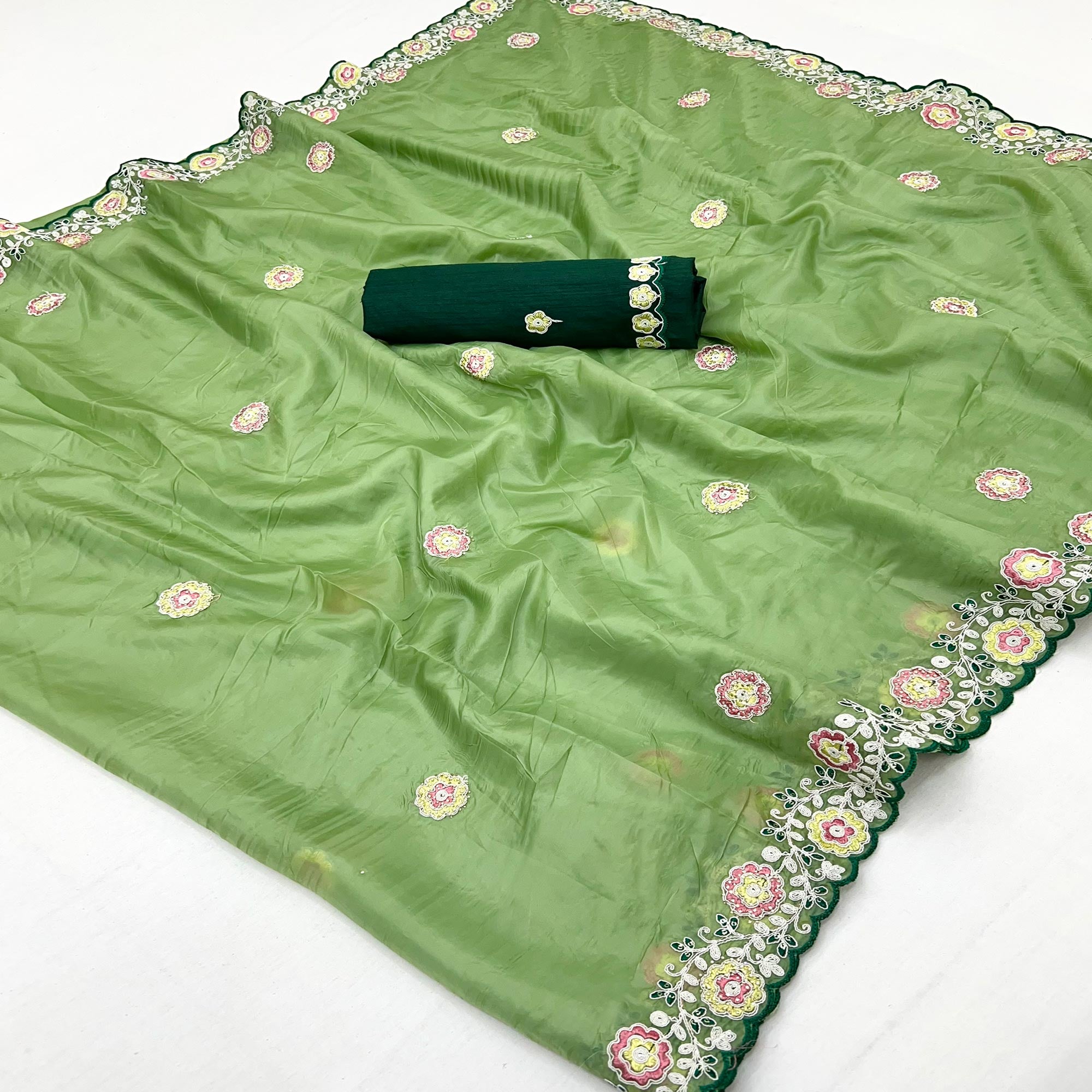Green Organza Saree Adorned with Intricate Floral Embroidery