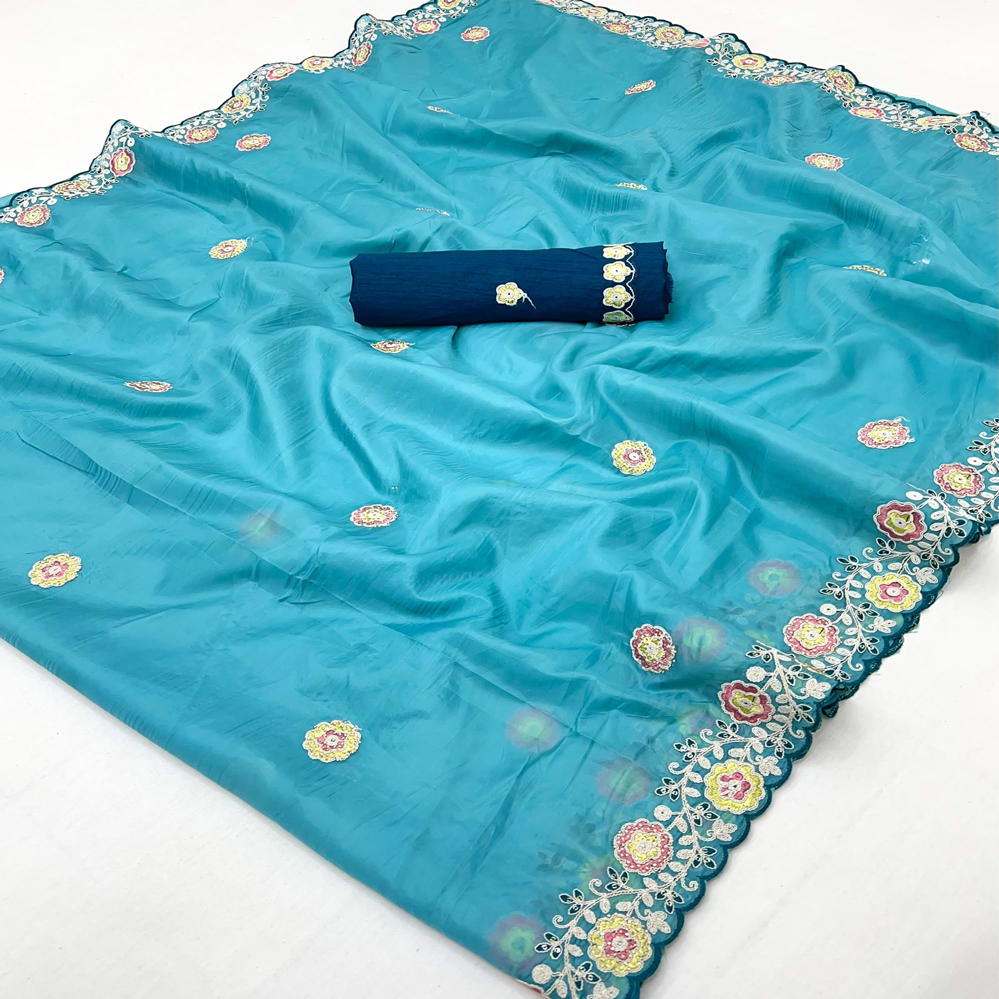 Blue Organza Saree Adorned with Intricate Floral Embroidery
