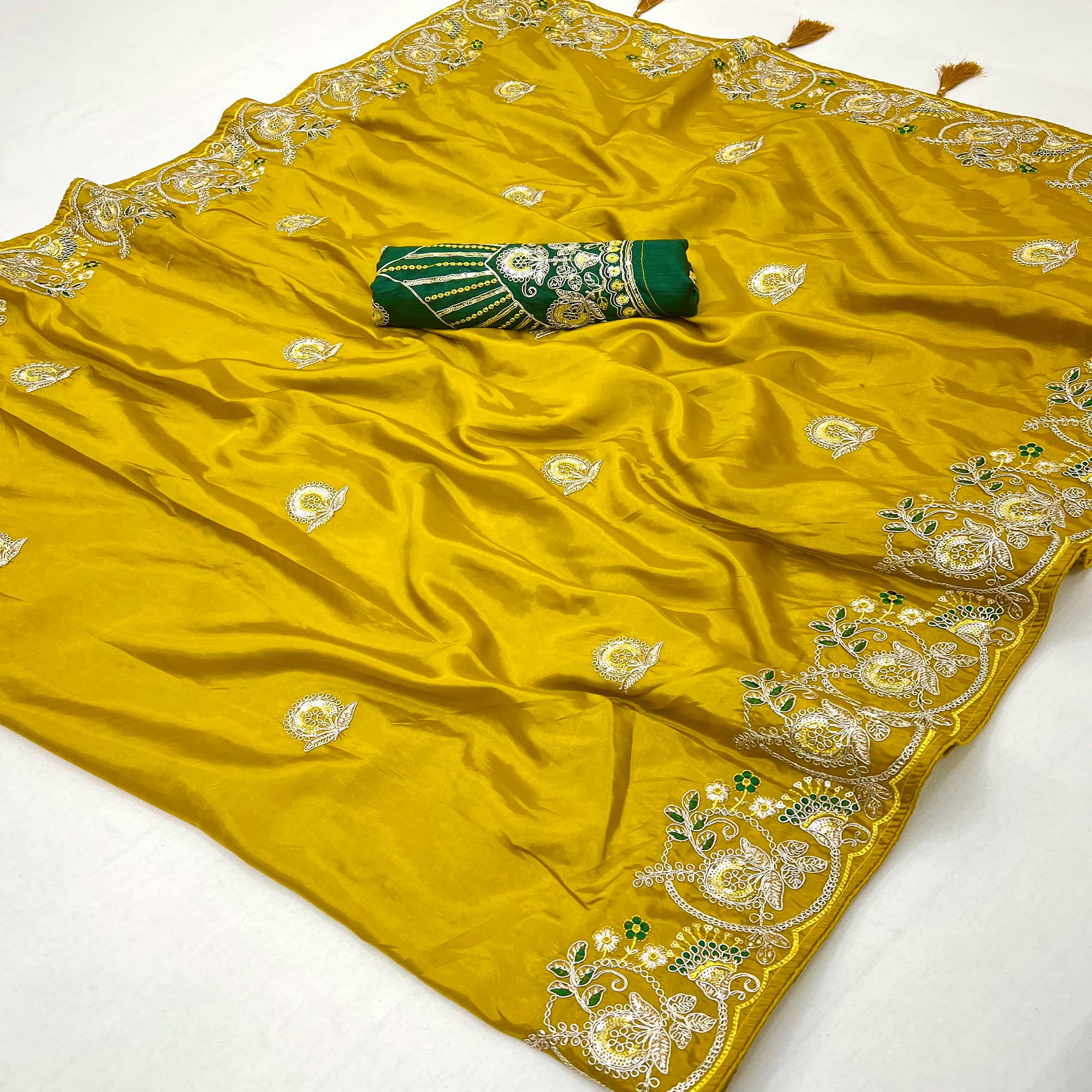 Mustard Embroidered Satin Saree with Smooth Texture and Graceful Festive Appeal