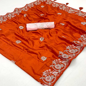Orange Embroidered Satin Saree with Smooth Texture and Graceful Festive Appeal