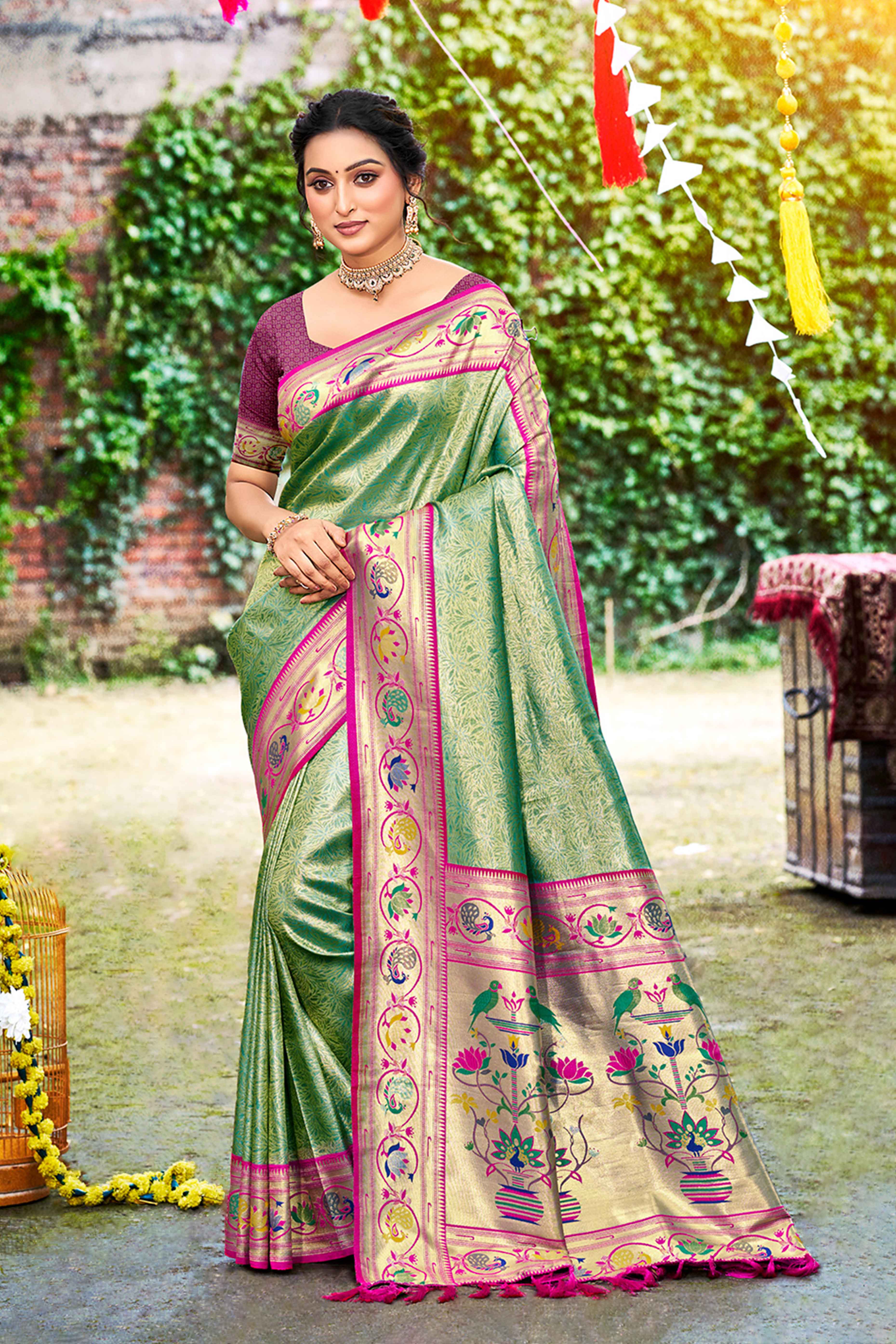 Elegant Rama Green Weaving Silk Blend Saree With Peacock Border & Artistic Parrot Motif Pallu