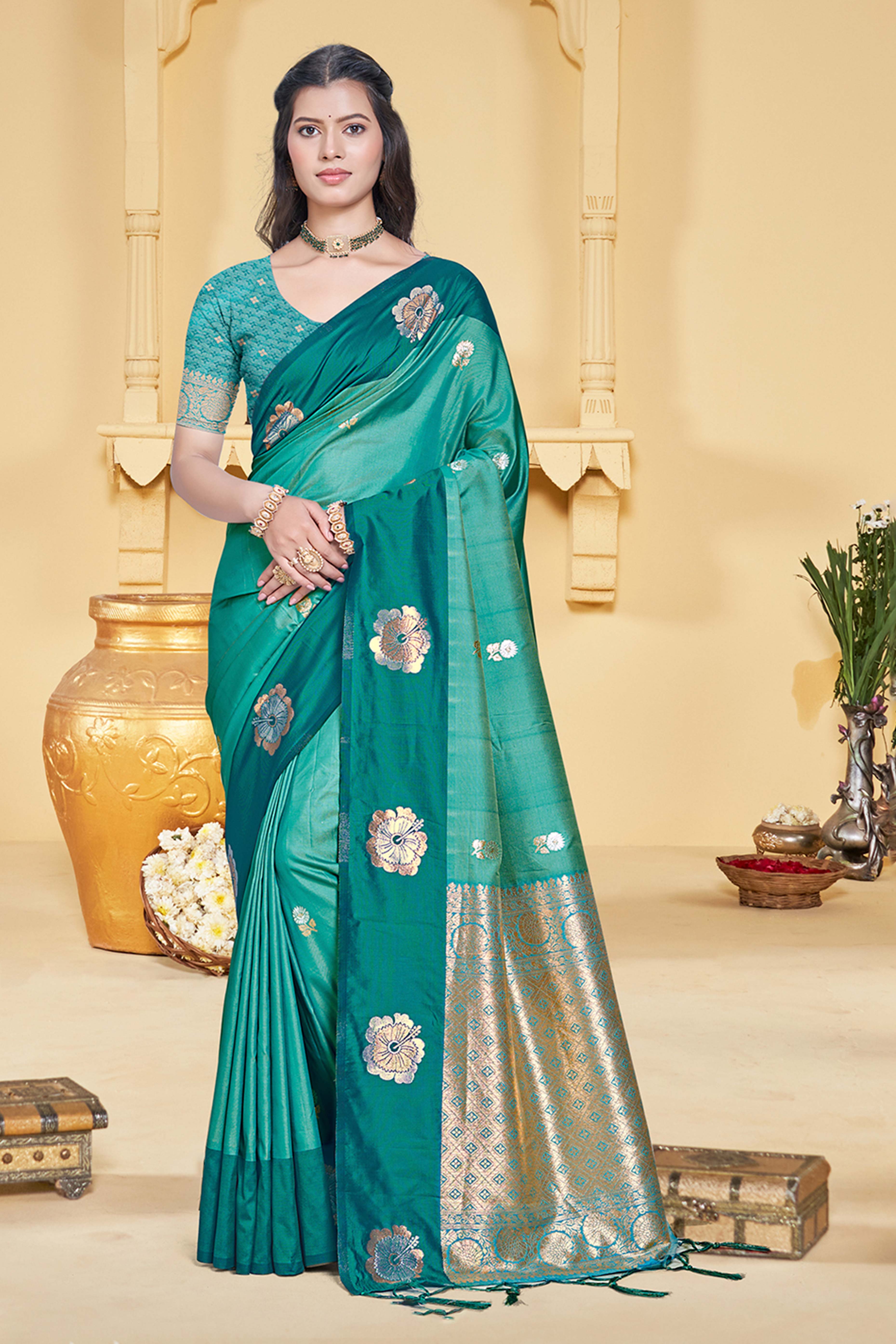 Charming Rama Green Floral Zari Weaving Silk Blend Saree Enhanced With Stylish Tassel Pallu