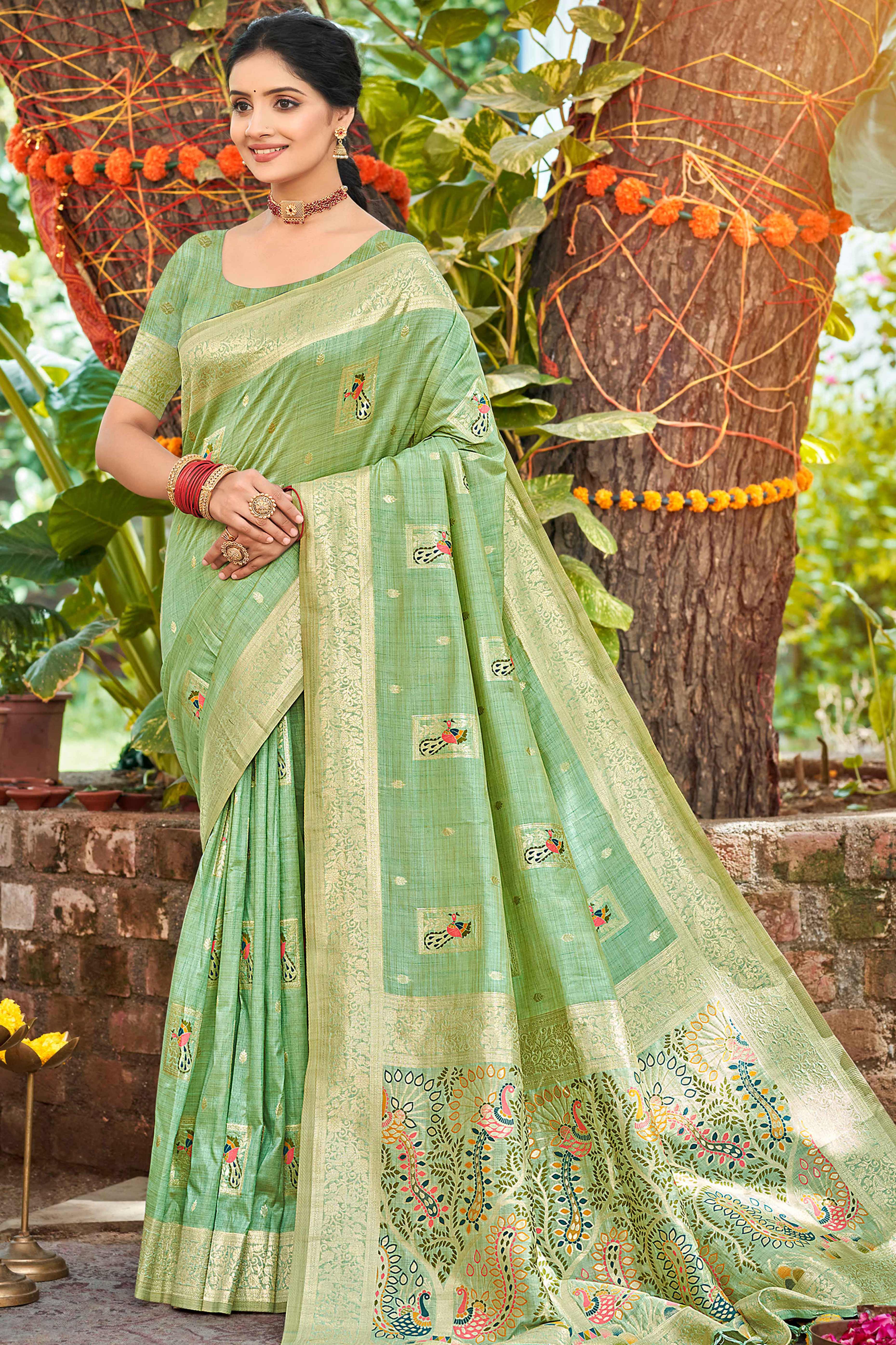 Sea Green Floral & Peacock Motif Zari Woven Assam Silk Blend Saree With Graceful Tassel Pallu