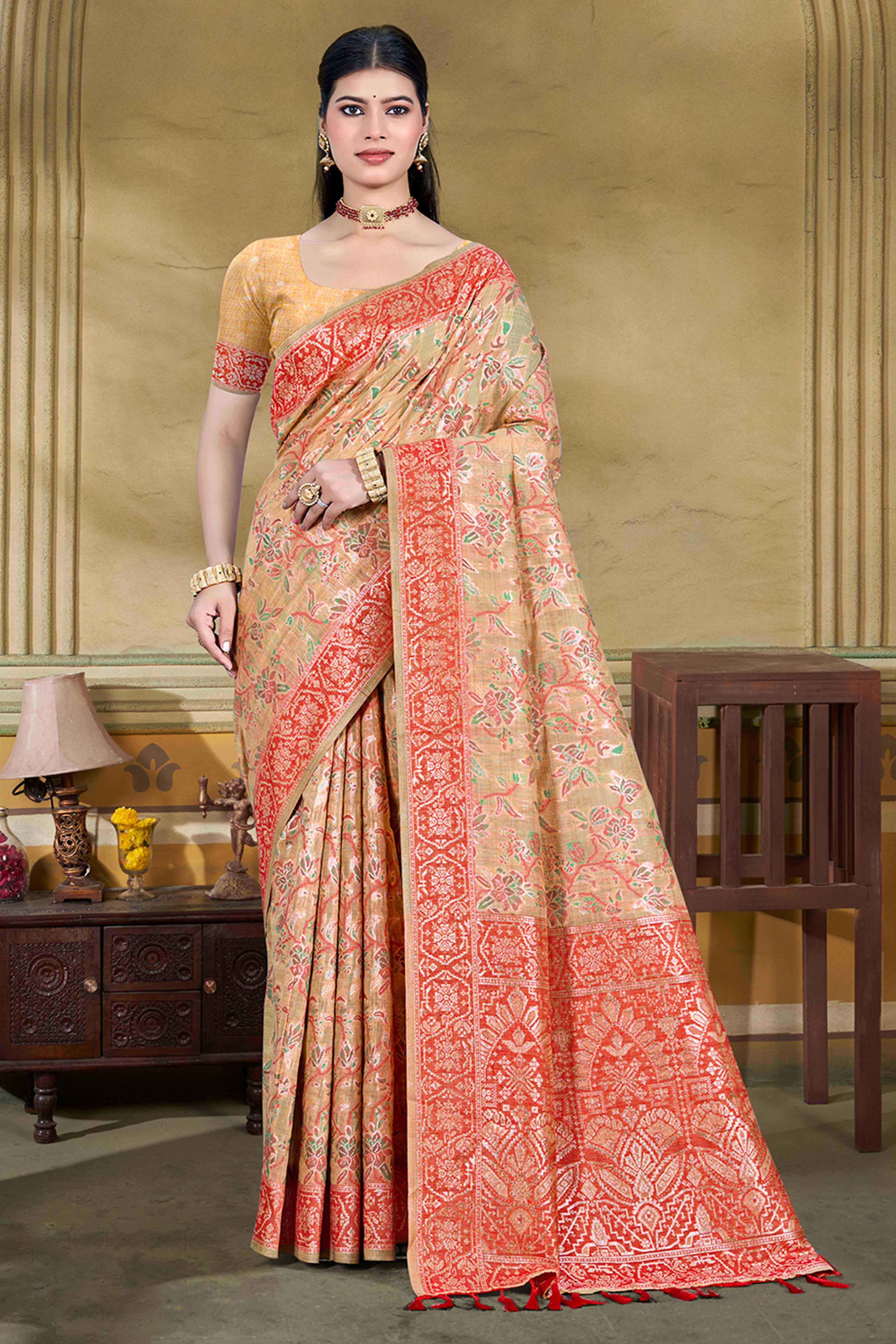 Alluring Light Peach Floral Zari Weaving Cotton Silk Saree With Graceful Tassel Pallu