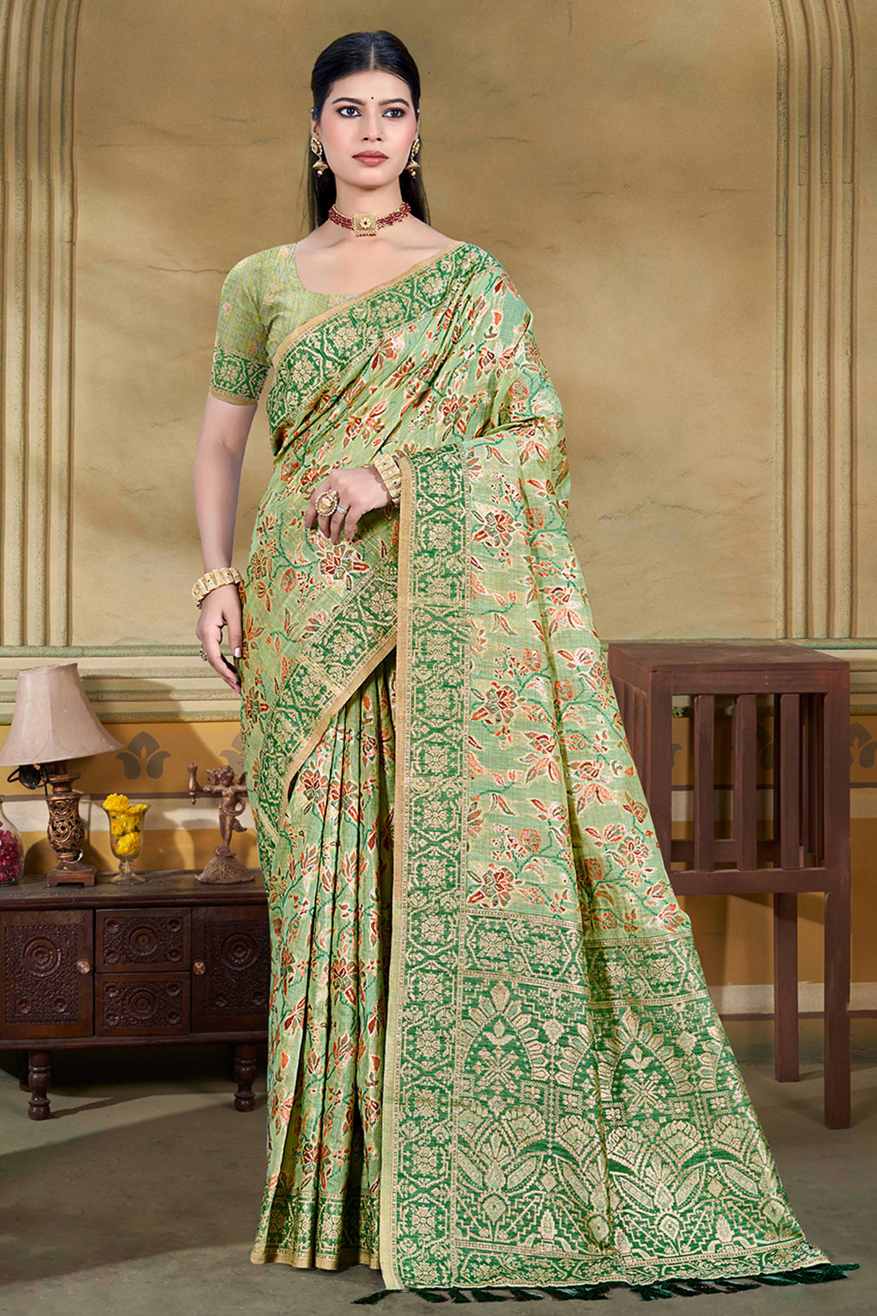 Alluring Green Floral Zari Weaving Cotton Silk Saree With Graceful Tassel Pallu