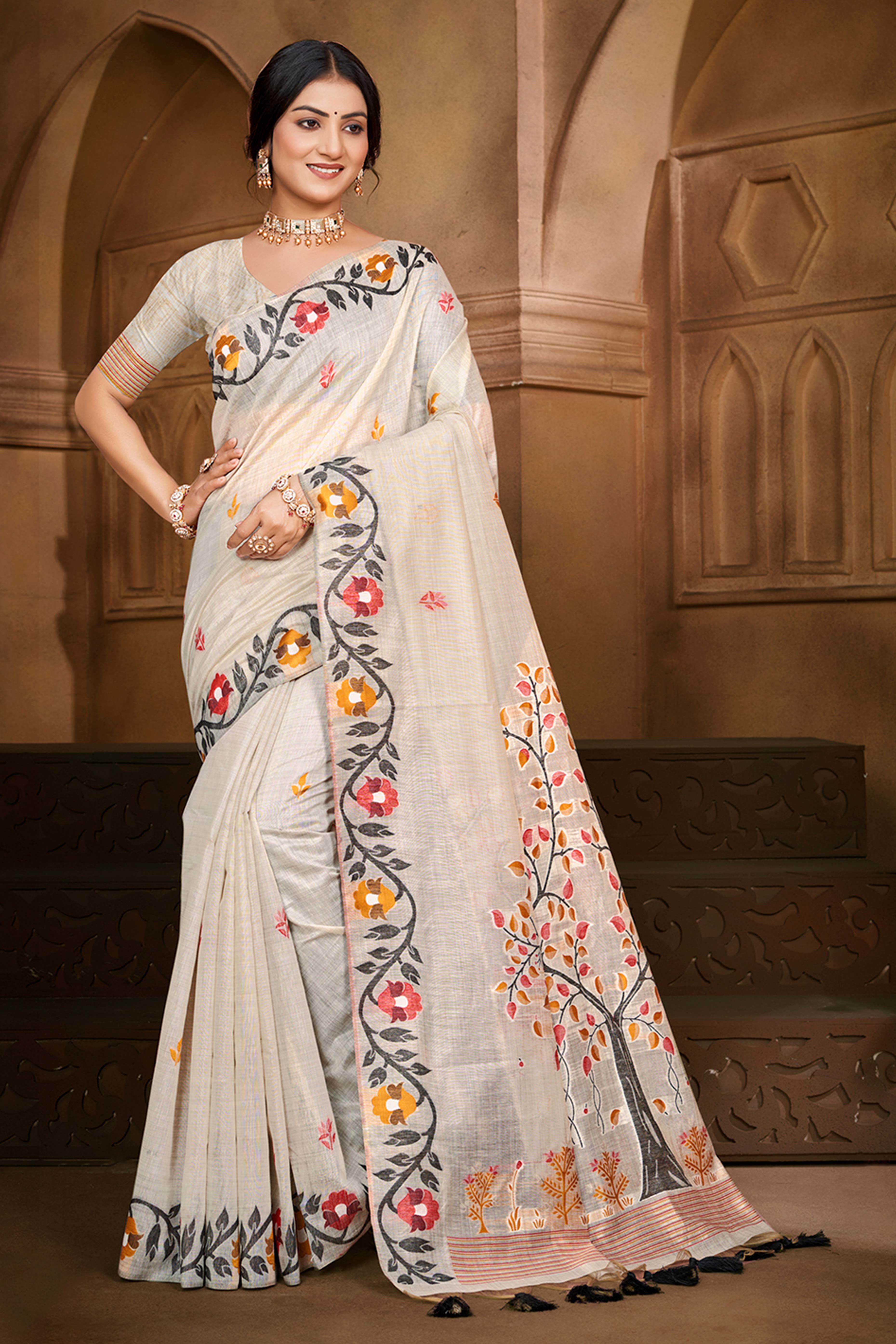 Charming Beige Floral Weaving Cotton Silk Saree Enhanced With Tree Motif Pallu With Tassel