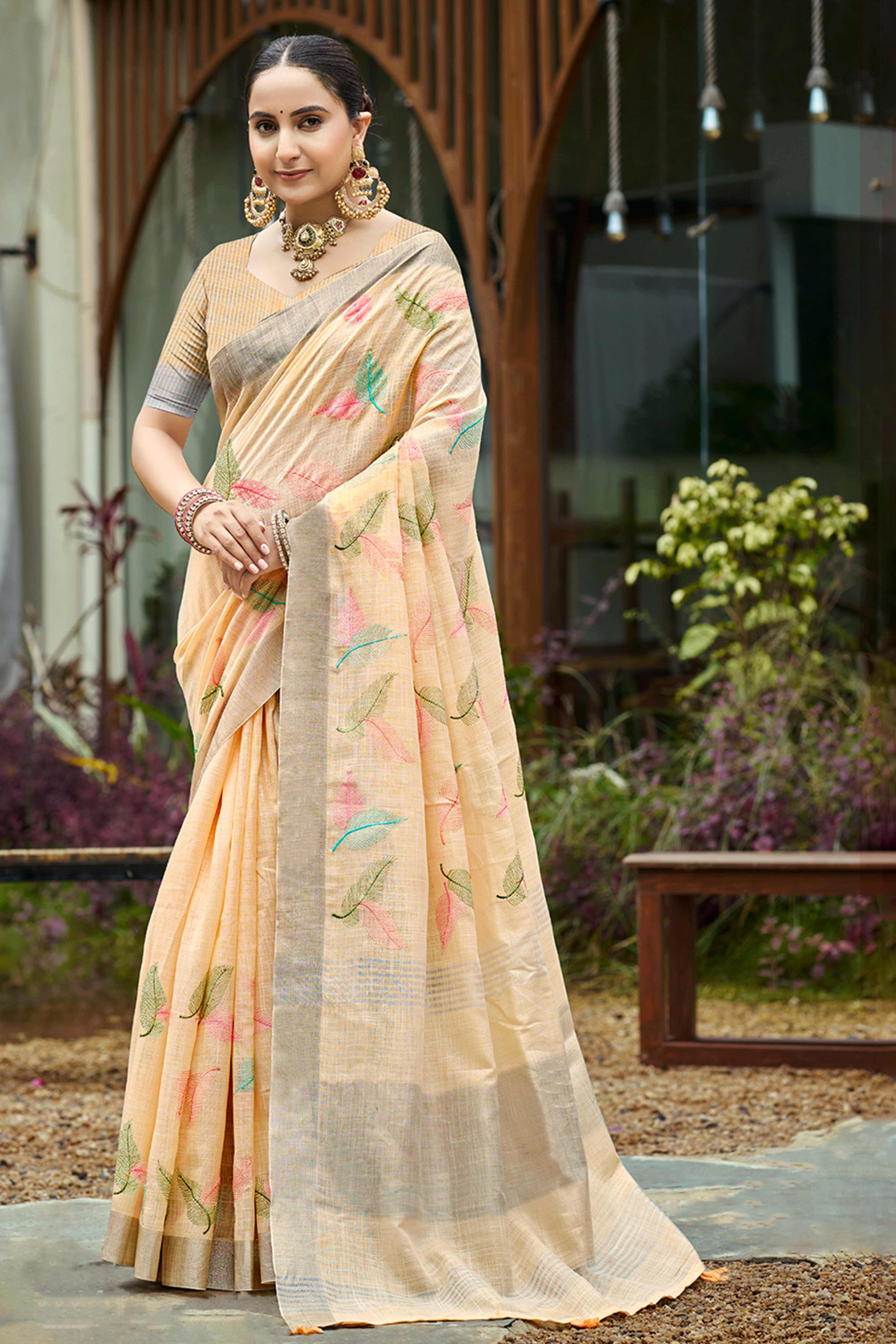 Exquisite Light Peach Leaf Motif Thread Embroidered Linen Saree With Elegant Weaving Border