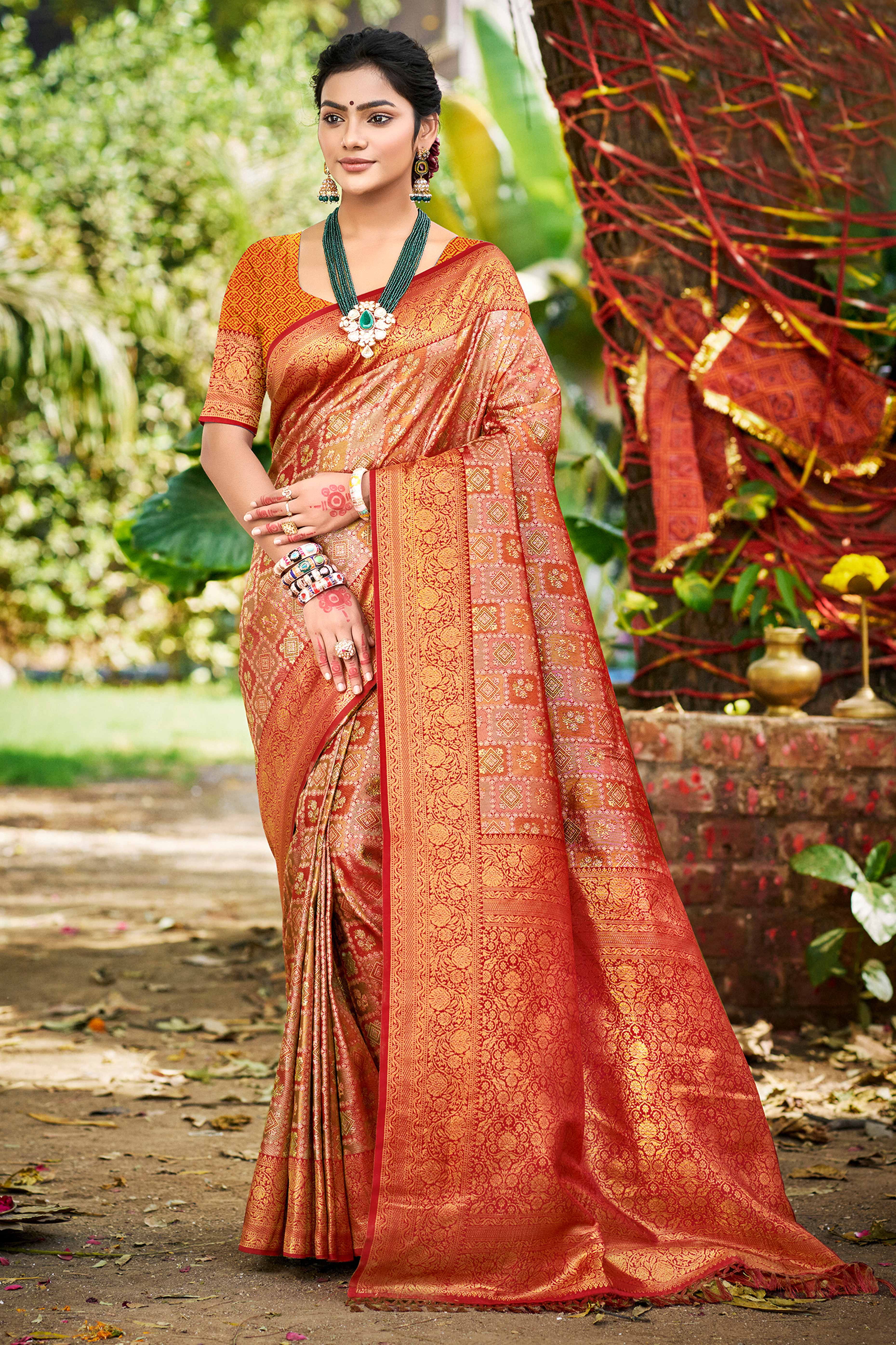 Red Silk Blend Dharmavaram Saree Featuring Ornate Floral Weaves & Tassels Pallu