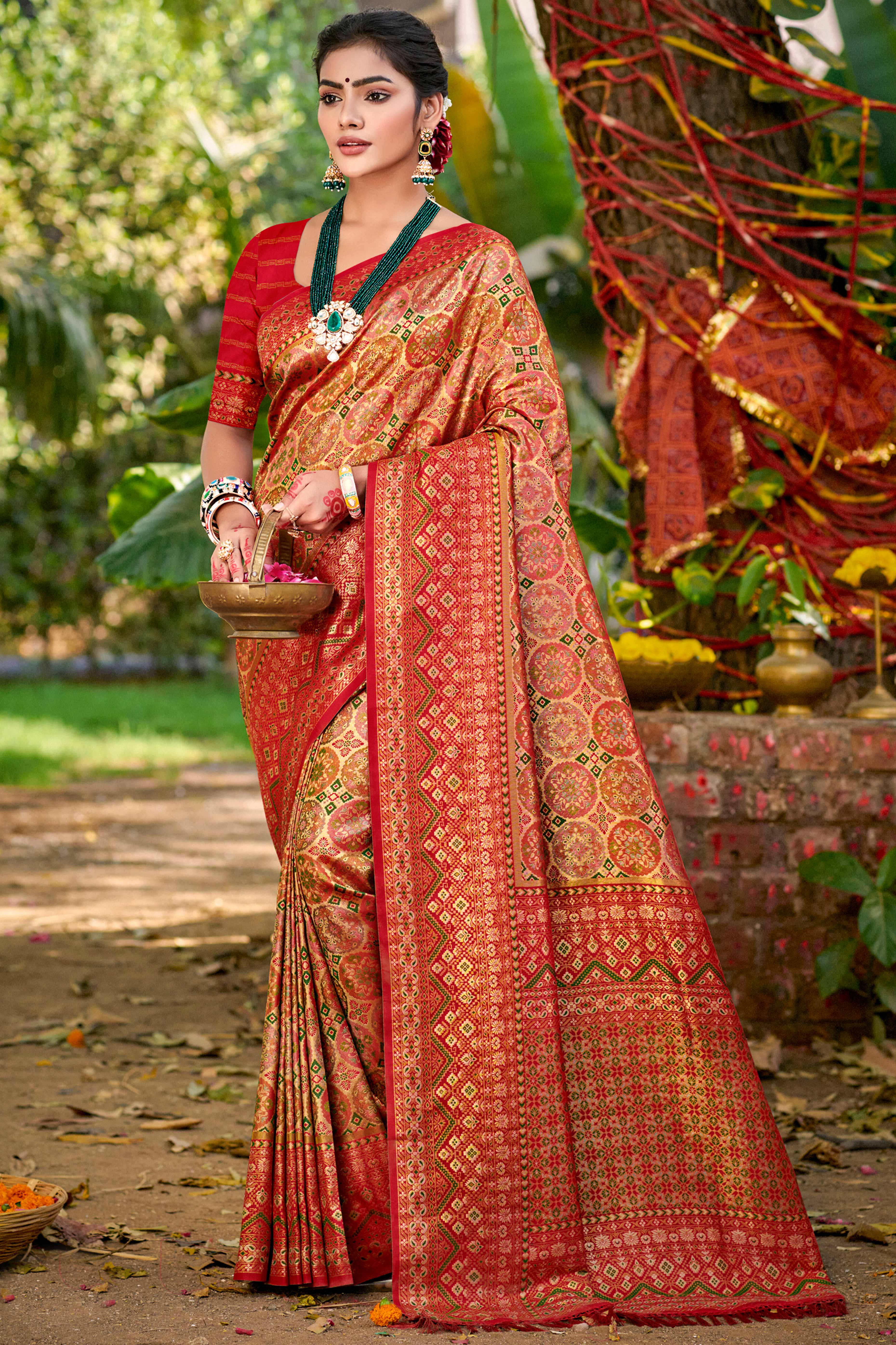 Floral Patterned Golden & Red Woven Silk Blend Dharmavaram Saree With Tassel Elegance