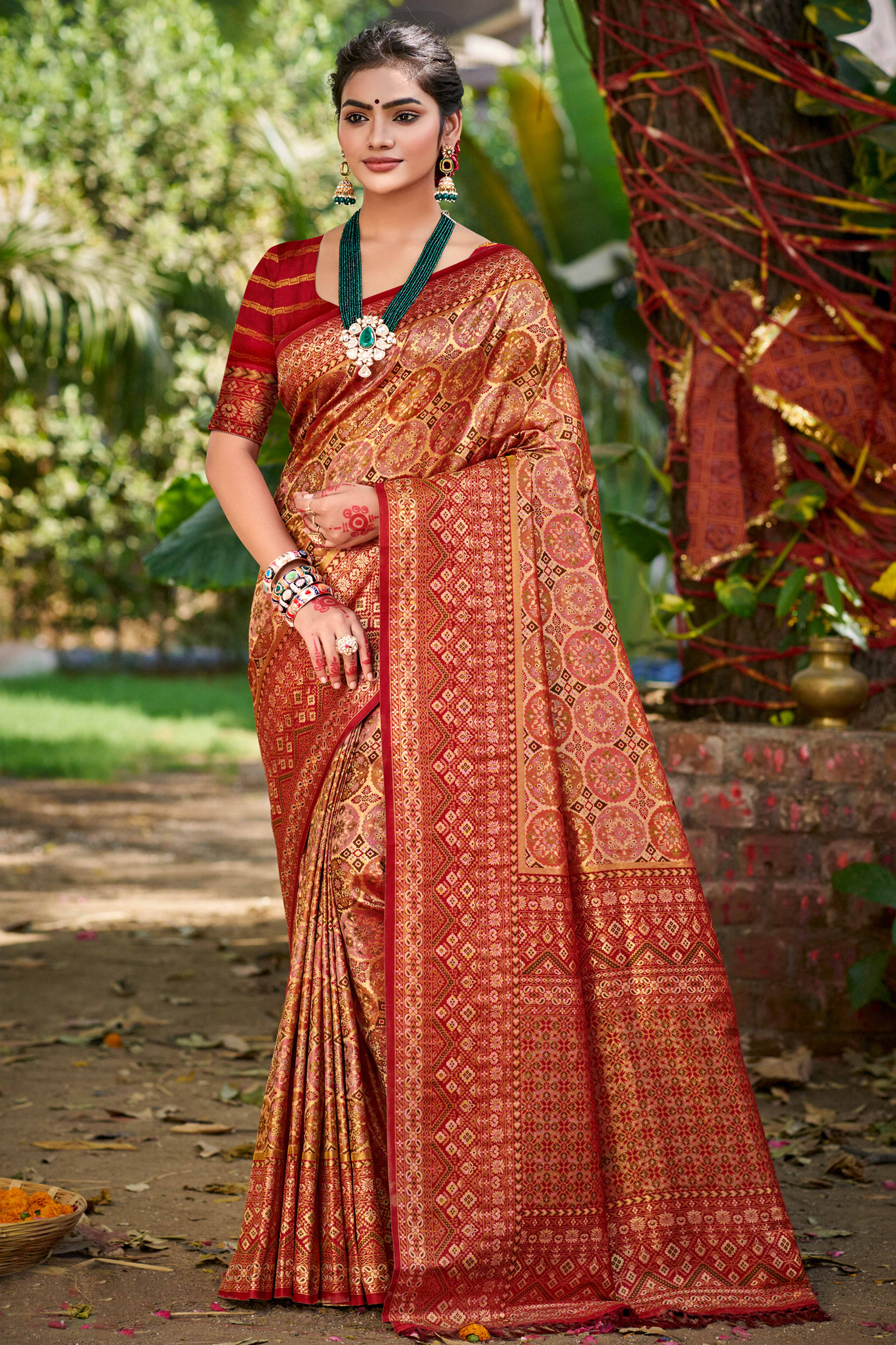 Floral Patterned Maroon Woven Silk Blend Dharmavaram Saree With Tassel Elegance