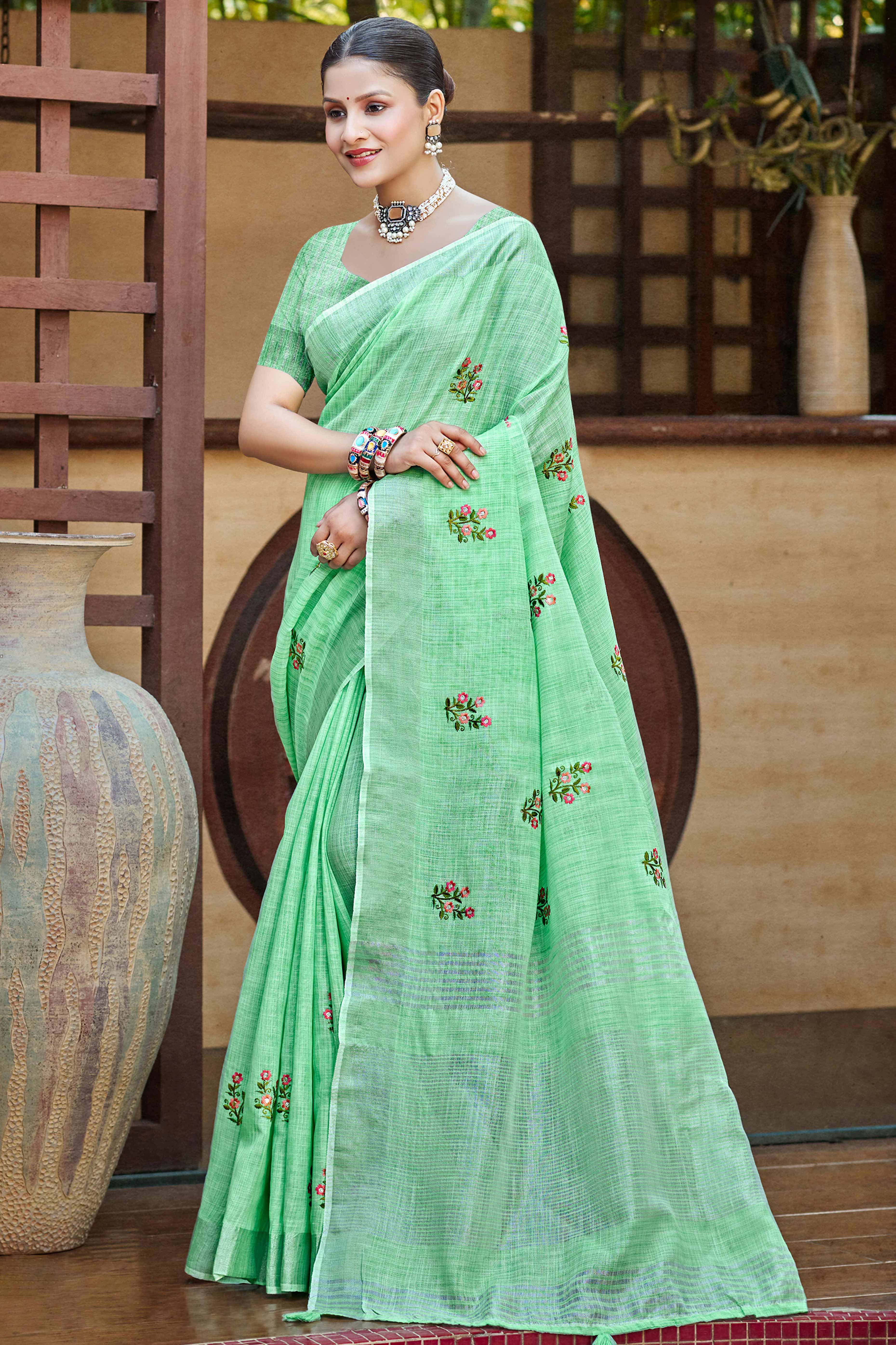 Pista Green Embroidered Linen Saree with Floral Motifs in Woven Fabric