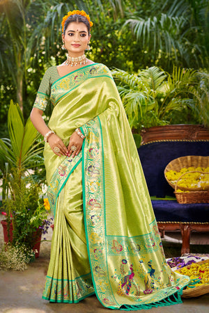 Graceful Green Silk Blend Saree Adorned With Intricate Zari Weave & Peacock Motif Pallu