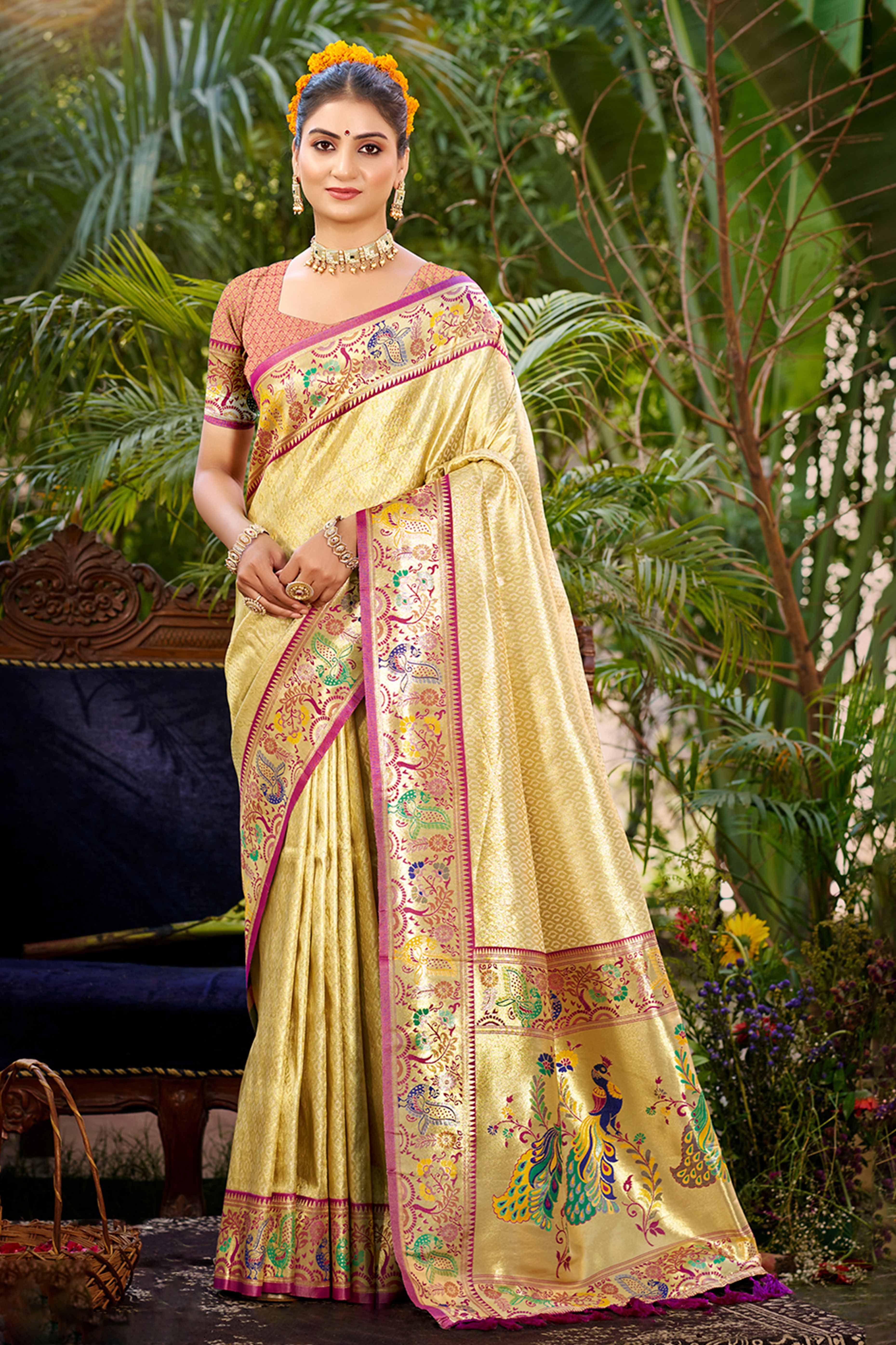 Graceful Golden Silk Blend Saree Adorned With Intricate Zari Weave & Peacock Motif Pallu