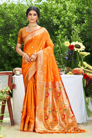 Orange Zari Weaving Silk Blend Saree Adorned With Intricate Peacock Motif Pallu & Graceful Tassel