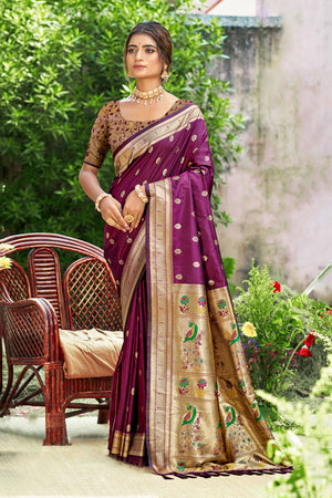 Wine Zari Weaving Silk Blend Saree Adorned With Intricate Peacock Motif Pallu & Graceful Tassel